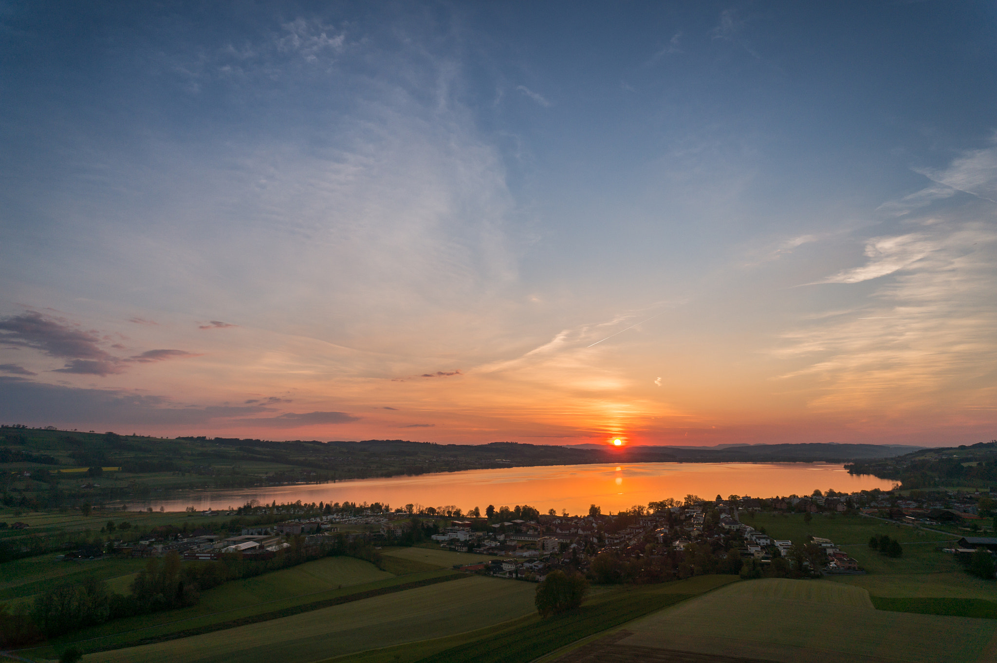 Sony Alpha NEX-5T + Sony E 16mm F2.8 sample photo. Sunset above the lake (drone picture) photography