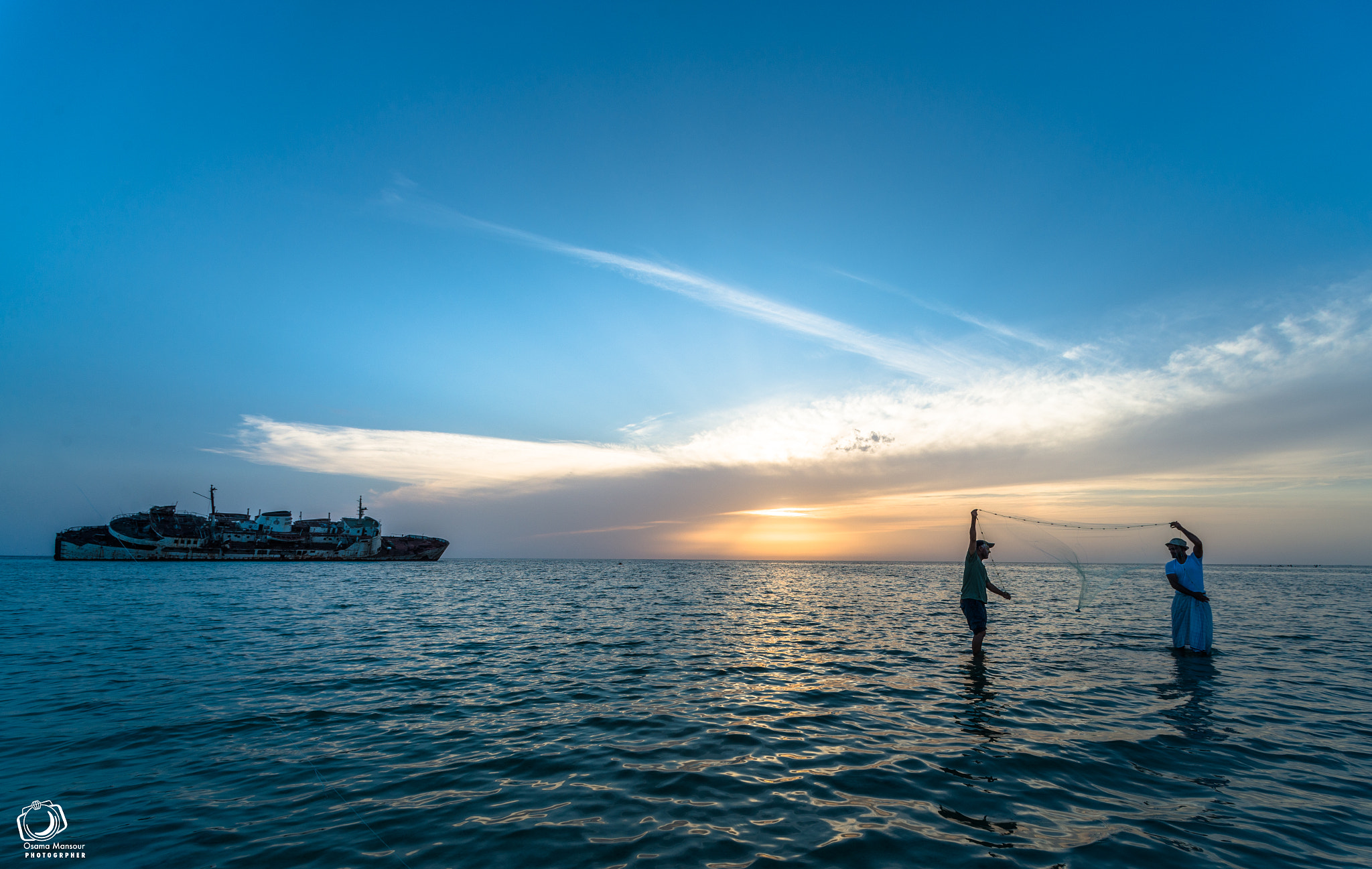 Nikon AF Nikkor 14mm F2.8D ED sample photo. Lovely sunset with fishermen photography