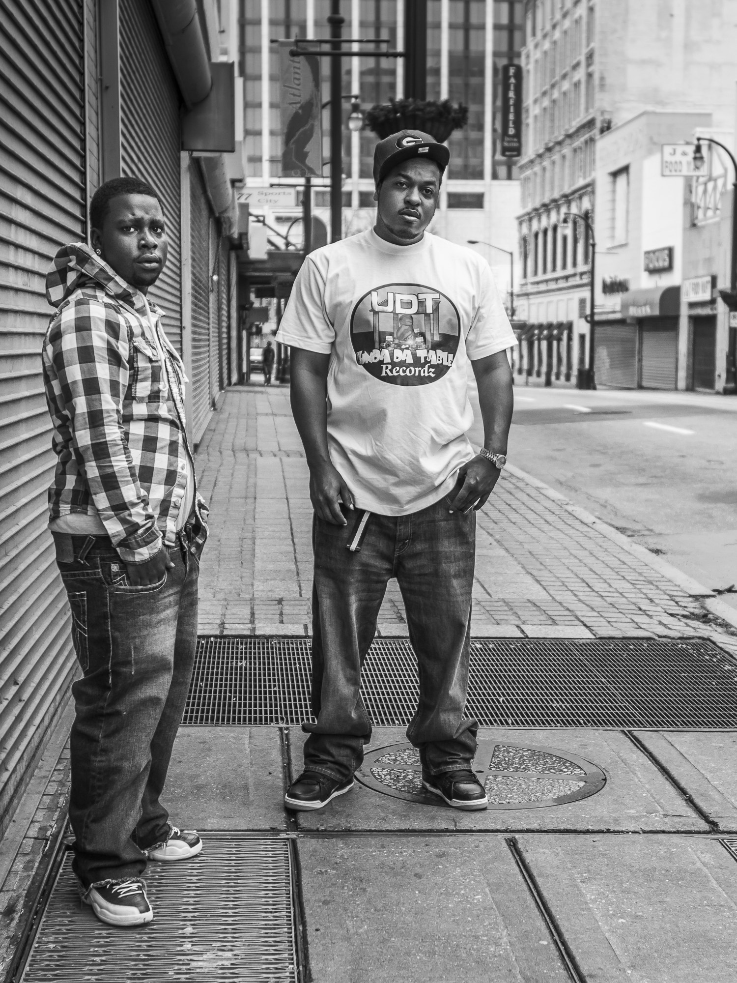 Canon EOS 550D (EOS Rebel T2i / EOS Kiss X4) sample photo. Young men on the streets of five points in downtown atlanta. photography