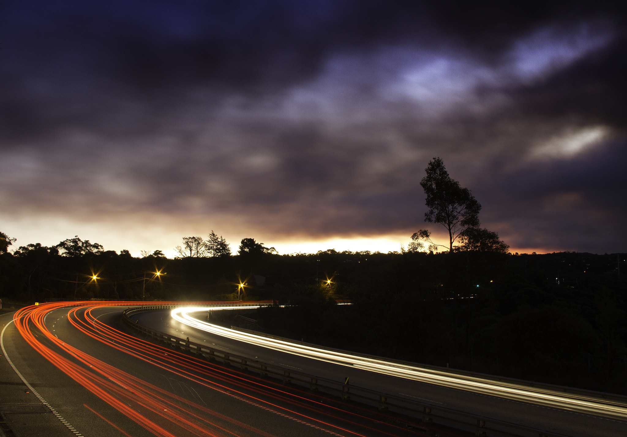 Canon EF 24-85mm F3.5-4.5 USM sample photo. Smoky skies while traffic flys by photography