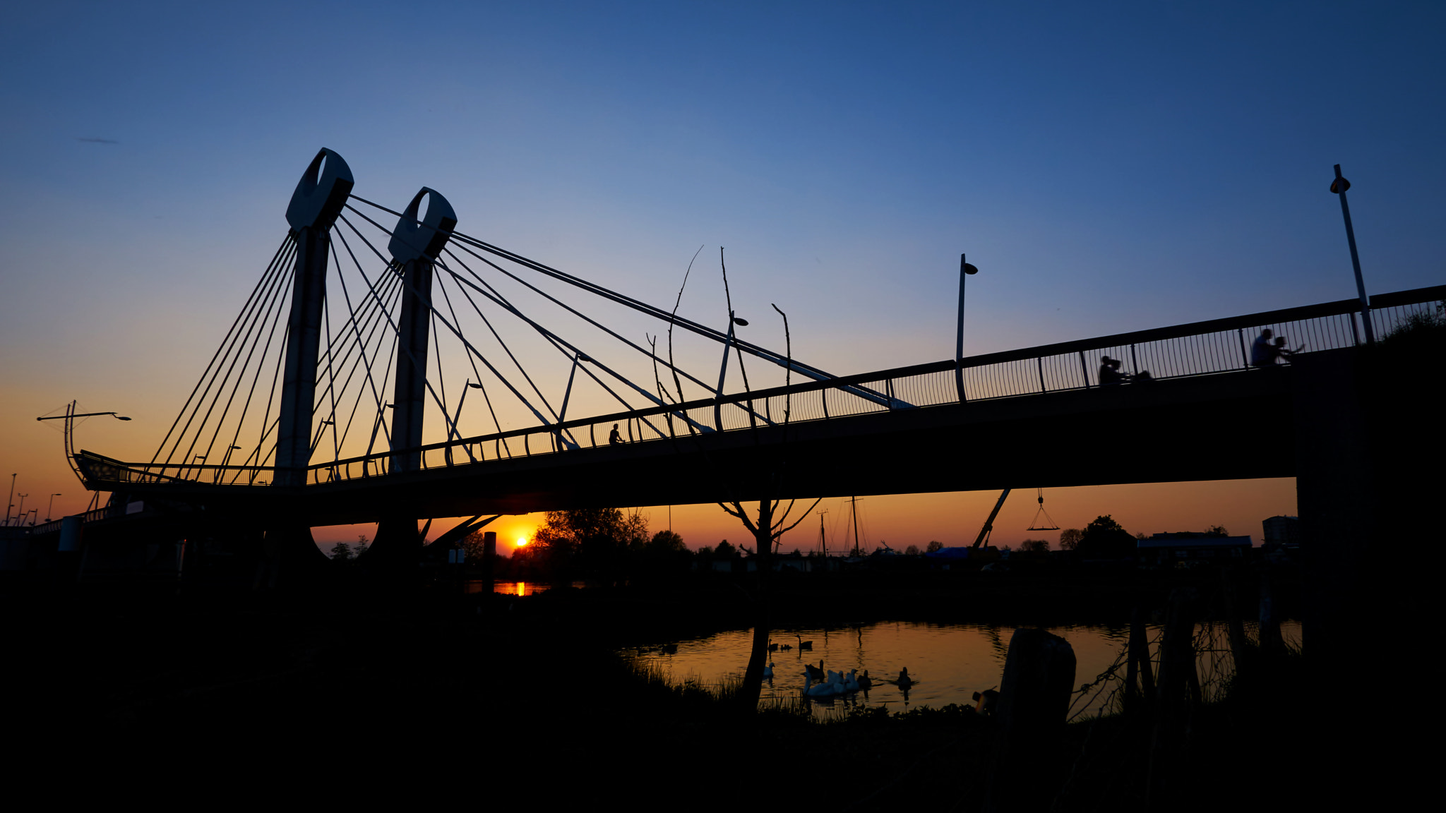 Sony ILCA-77M2 + 10-20mm F3.5 sample photo. Sunset on a bridge photography