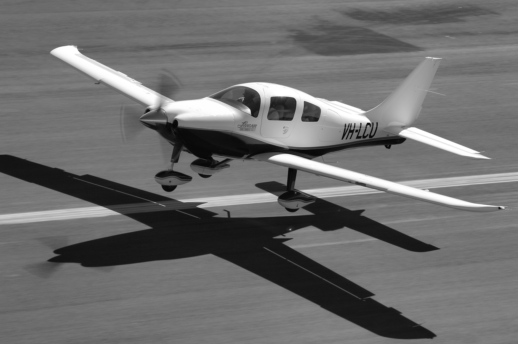 Nikon D2X sample photo. Lancair landing photography