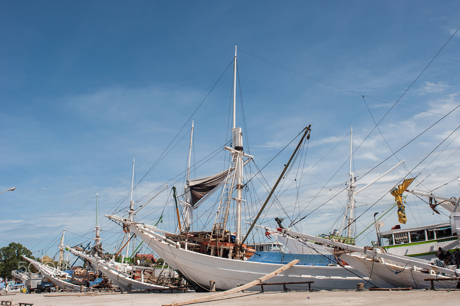Nikon D90 + Nikon AF Nikkor 24mm F2.8D sample photo. Wooden ships anchored at paotere harbor in makassar, indonesia. photography