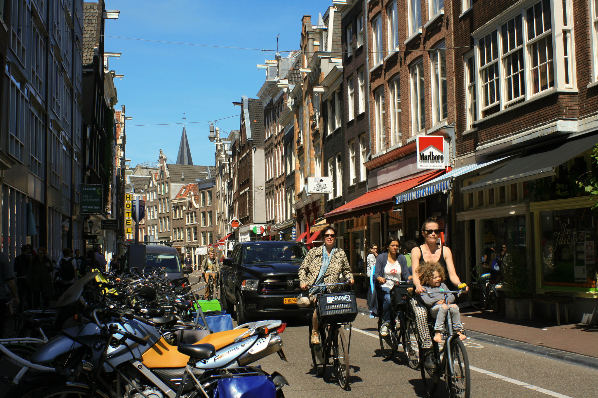 Canon EF 28-90mm f/4-5.6 sample photo. The happy cyclists photography