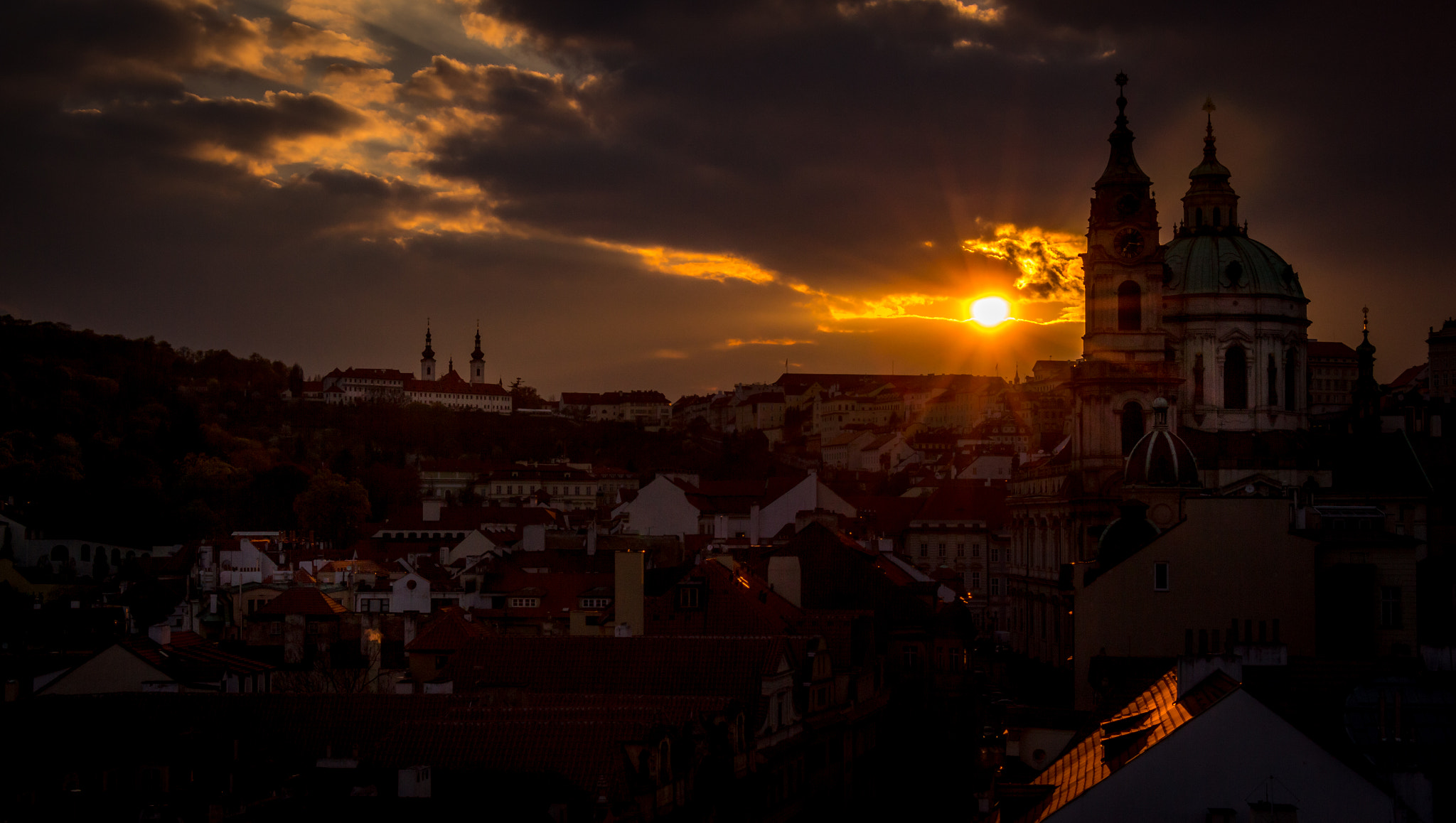 Canon EF-S 18-135mm F3.5-5.6 IS STM sample photo. St. nicolas church, prague, at sunset photography