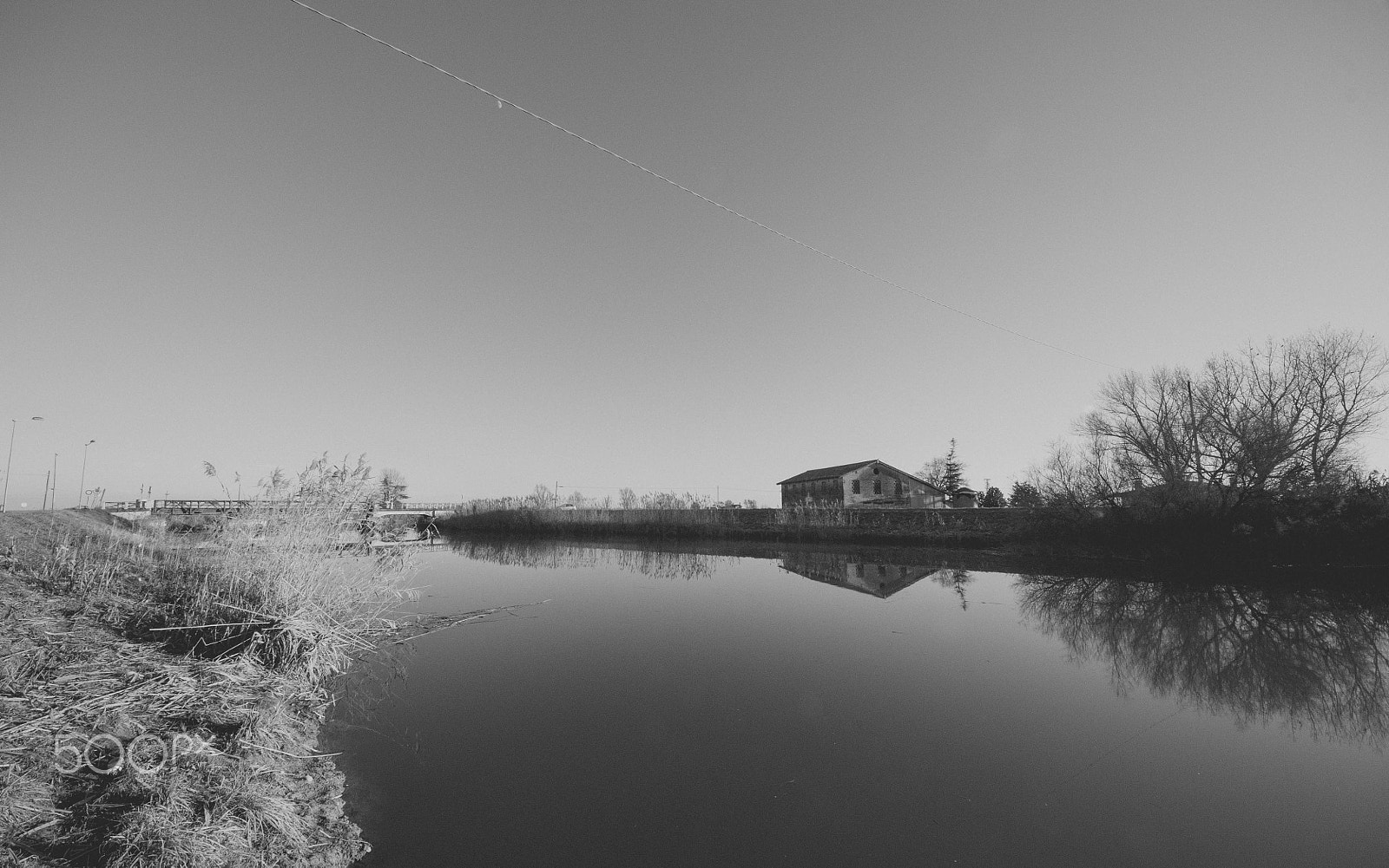 Sigma 8-16mm F4.5-5.6 DC HSM sample photo. Black and white river photography