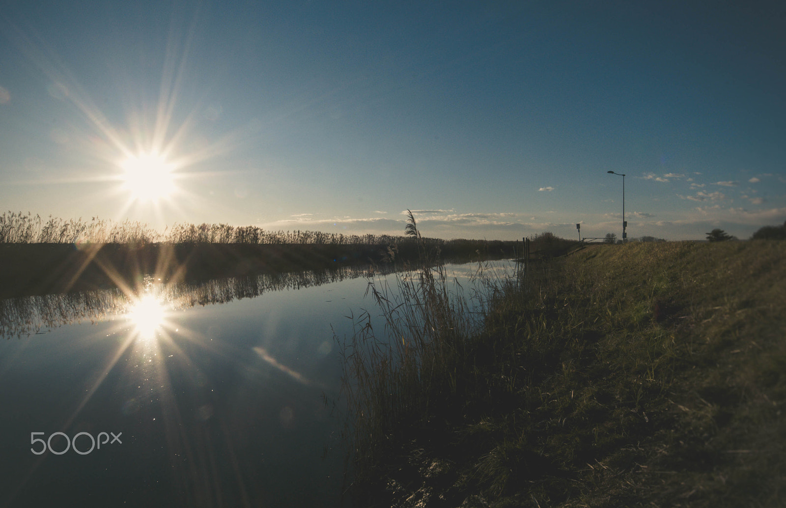Sigma 8-16mm F4.5-5.6 DC HSM sample photo. Blue river blue sky photography