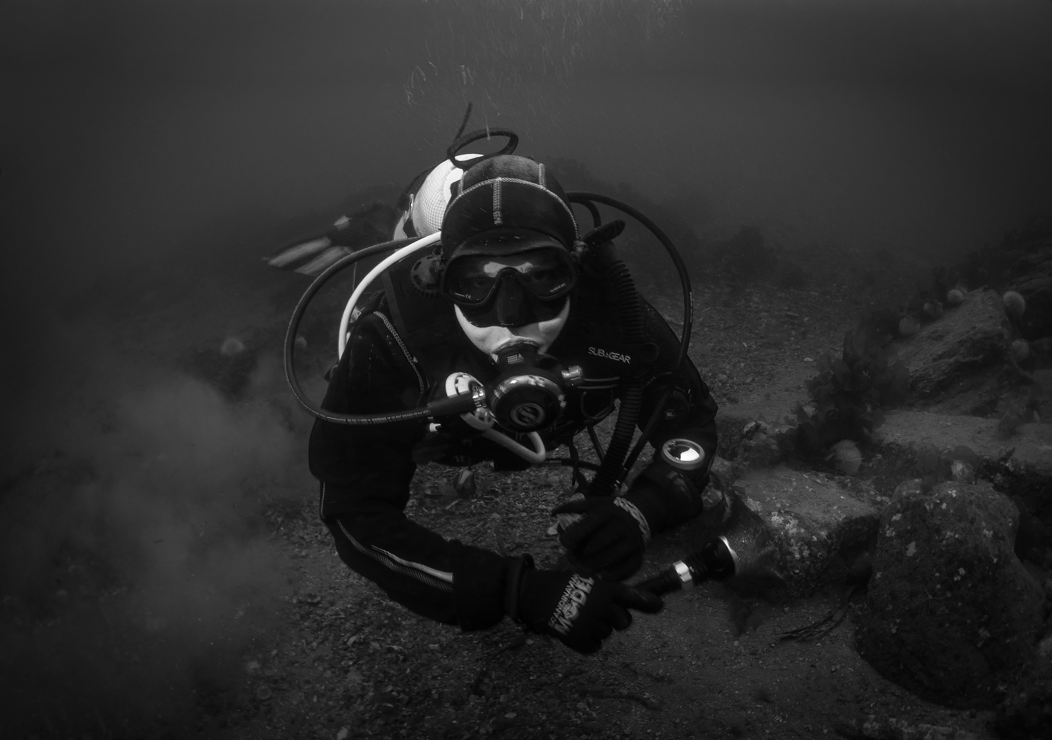 Nikon D750 + Sigma 15mm F2.8 EX DG Diagonal Fisheye sample photo. Black & white diver portrait photography