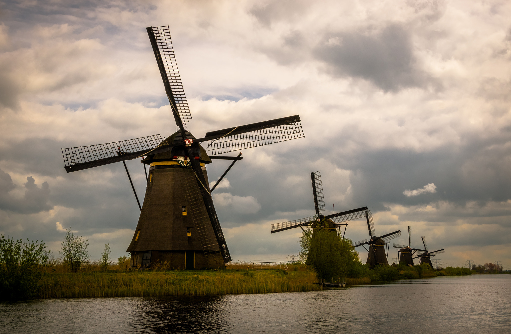 Nikon D7000 + Sigma 24-105mm F4 DG OS HSM Art sample photo. Windmills and clouds photography