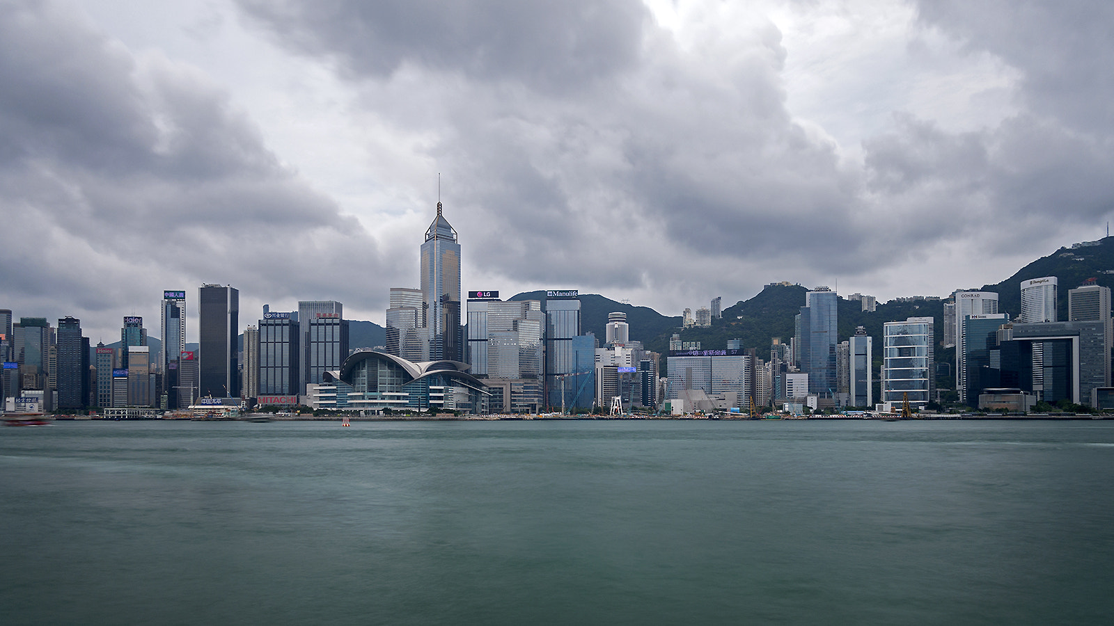 Olympus PEN E-PL6 + Panasonic Lumix G 14mm F2.5 ASPH sample photo. Victoria harbour under cloud photography