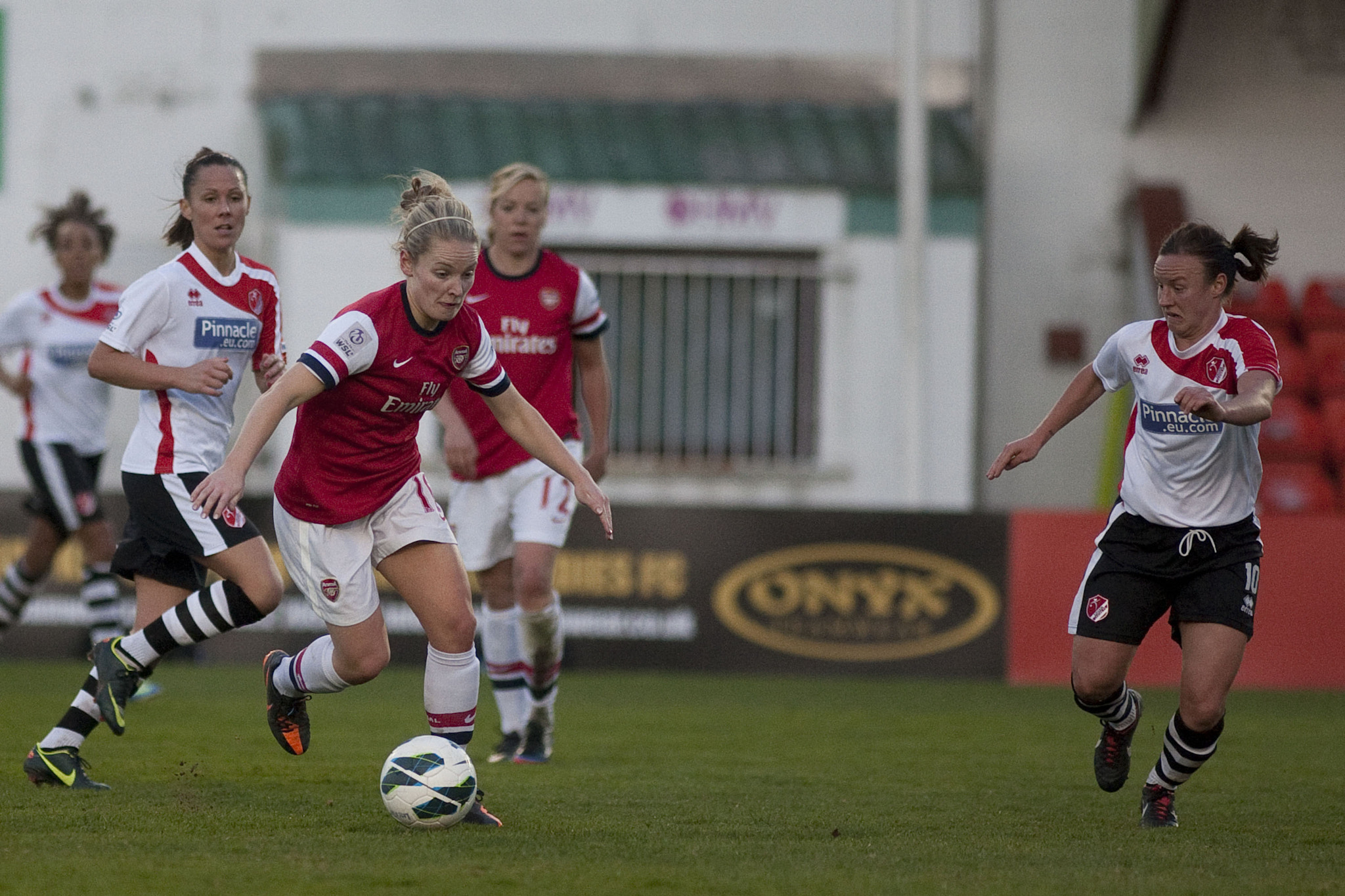 Canon EOS-1D Mark III + Canon EF 200mm f/1.8L sample photo. Kim little causing havoc for arsenal
 - lincoln ladies vs arsenal ladies - fa womens super league... photography