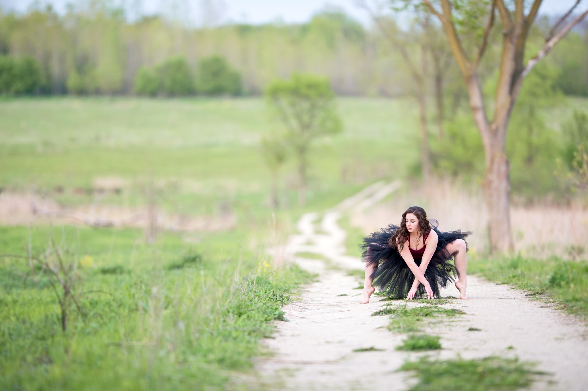 Nikon AF-S Nikkor 200mm F2G ED VR II sample photo. Dancer on the dirt road photography