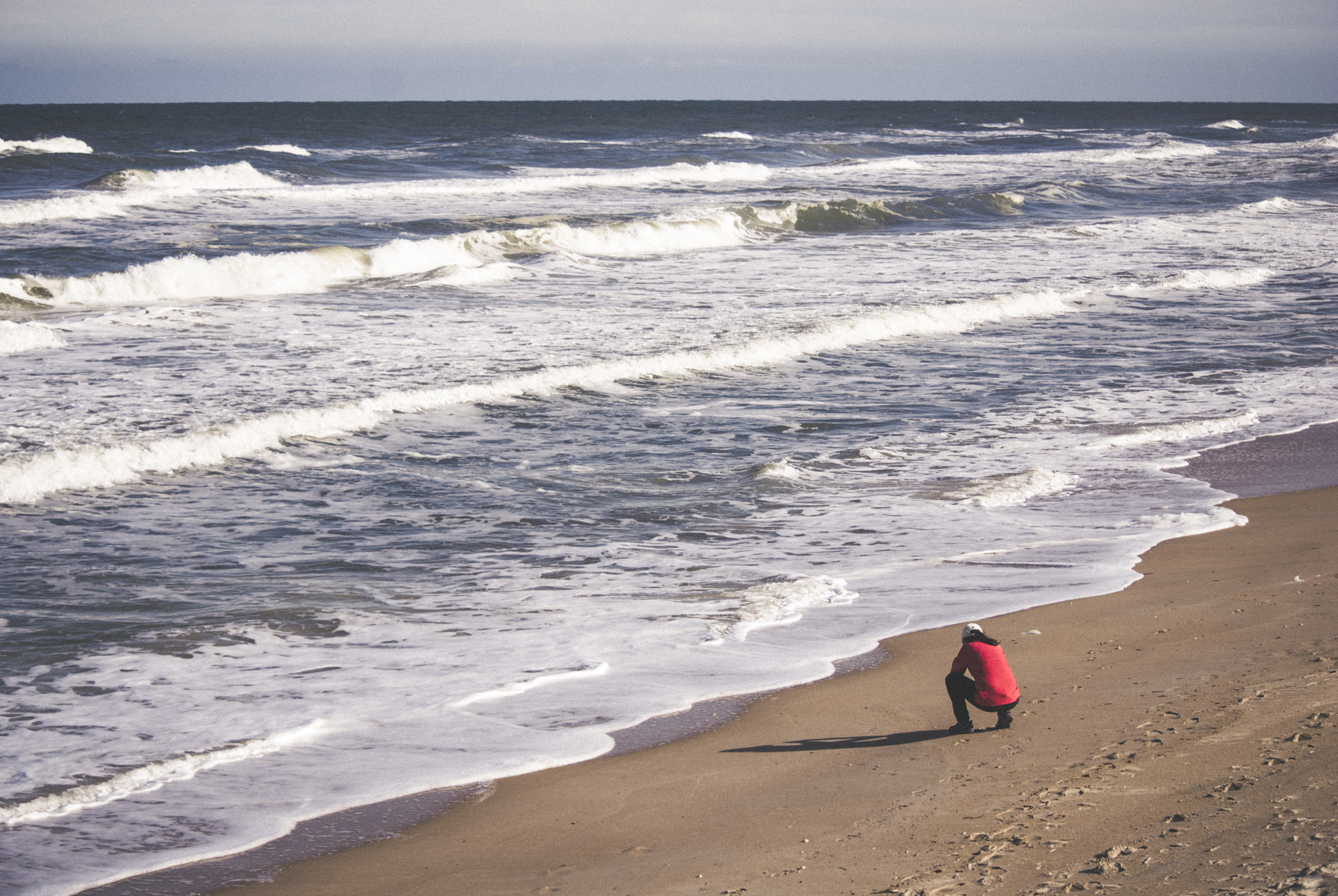Nikon D80 sample photo. Kneeling before the waves photography