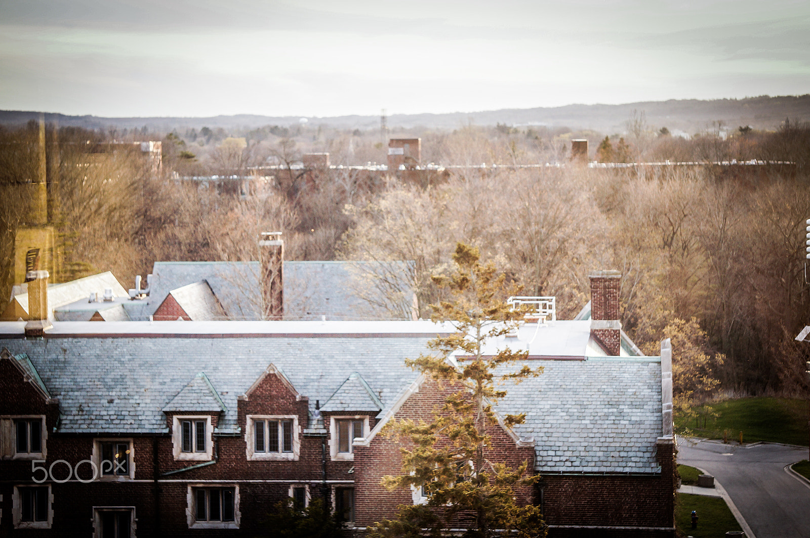 Sony Alpha NEX-3N + Sony E 55-210mm F4.5-6.3 OSS sample photo. Edward hall's rooftop | mcmaster university photography