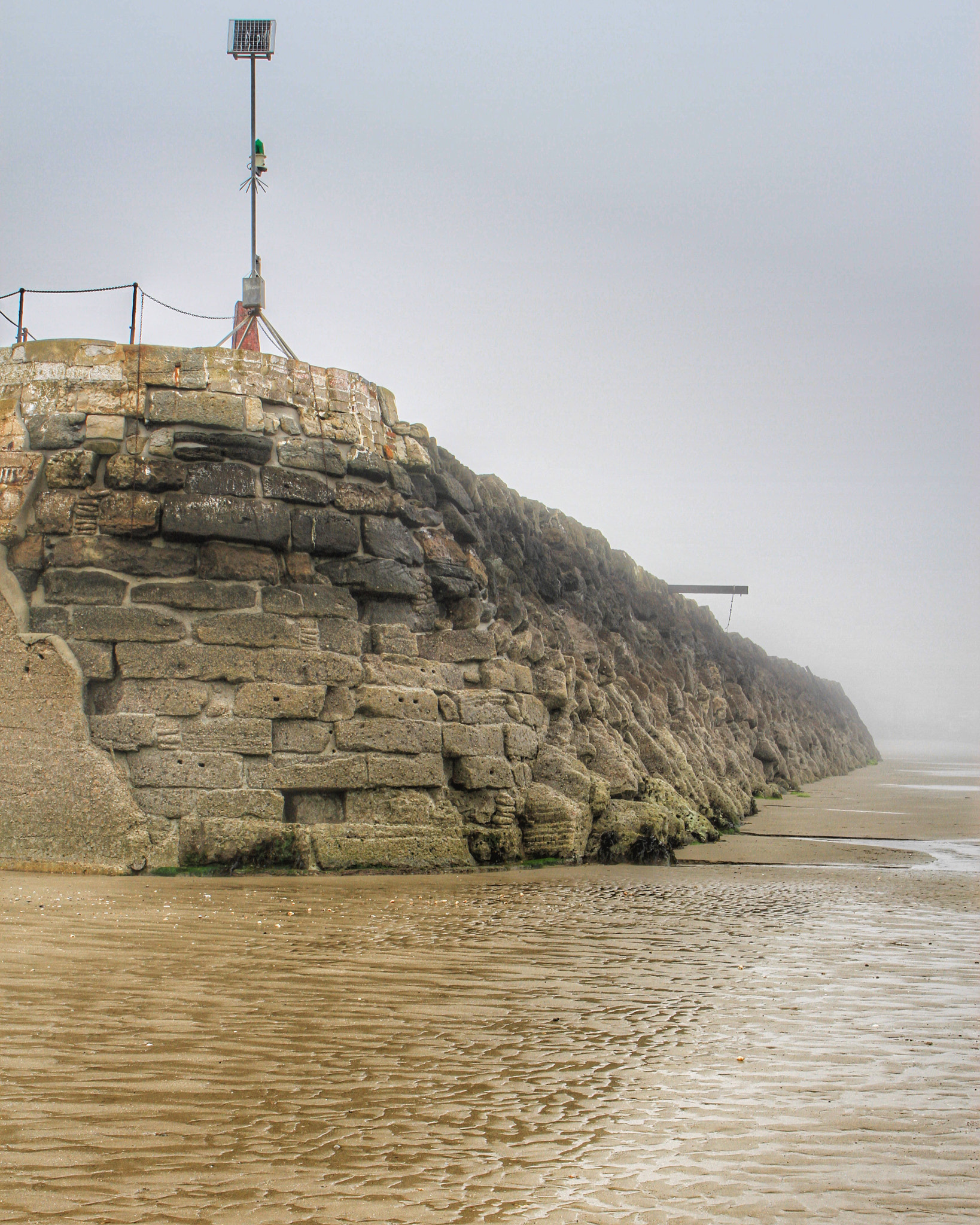 Canon EOS 7D + Canon 18-270mm sample photo. "harbour arm" made the most of the fog today photography