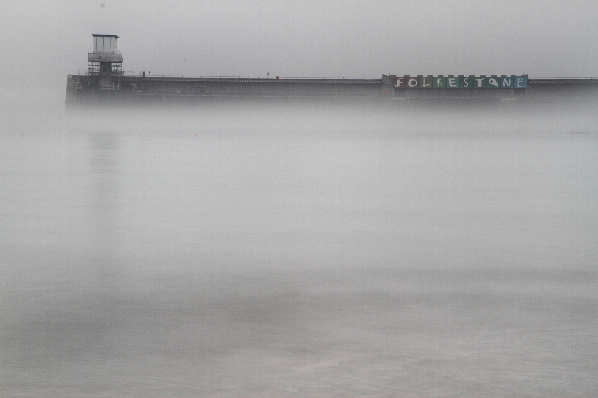 Canon EOS 7D + Canon 18-270mm sample photo. "harbour wall" made the most of the fog today photography