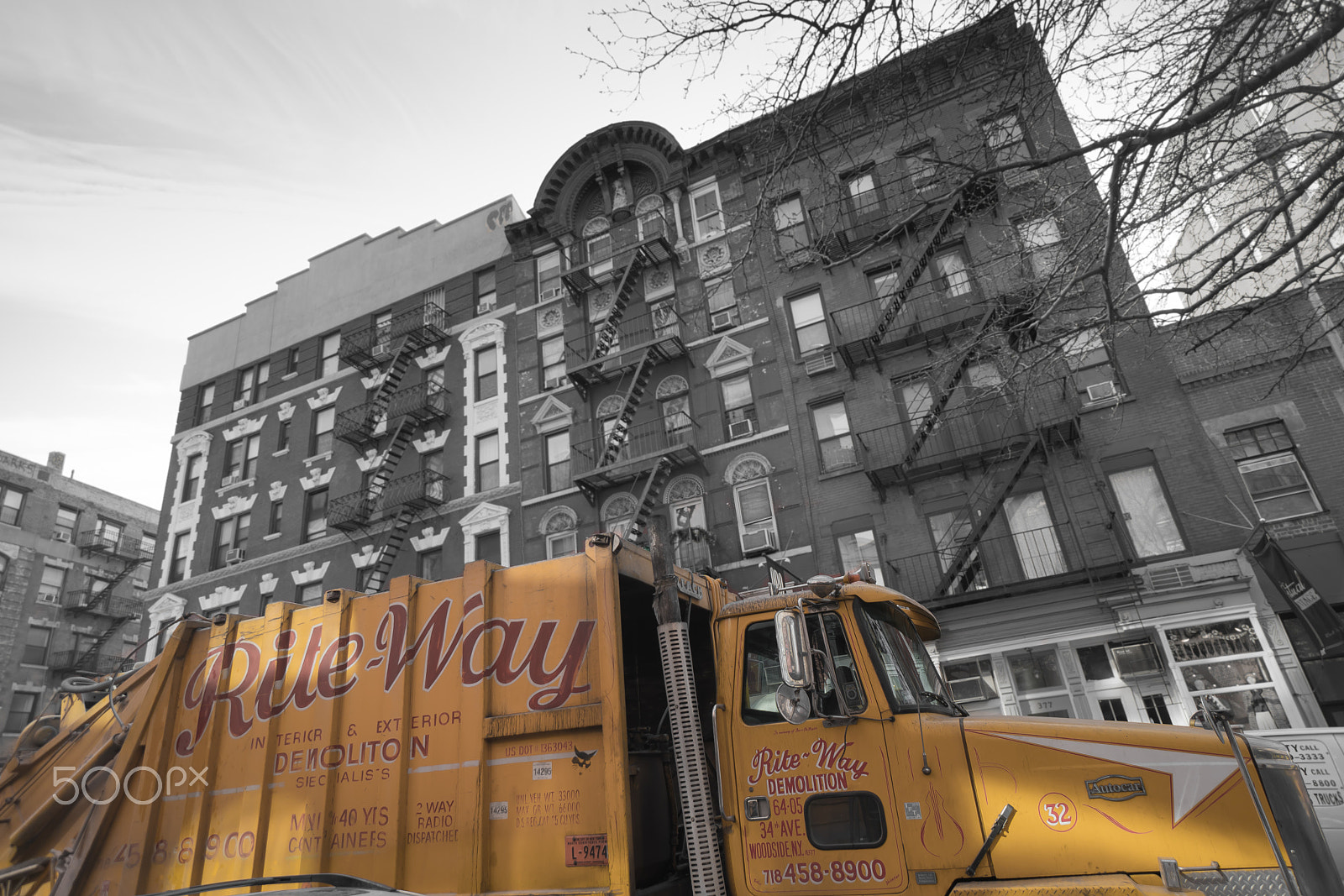 Sony a7R II + Sony E 10-18mm F4 OSS sample photo. Yellow demo truck photography