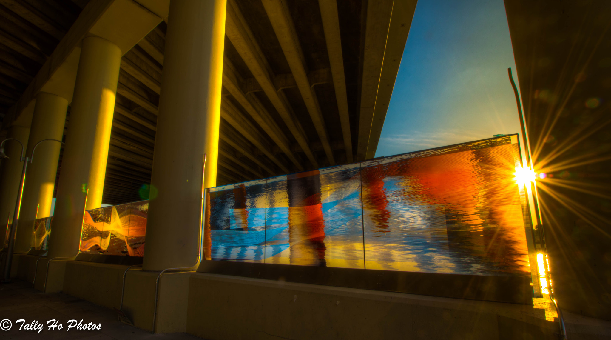 Canon EF-S 10-18mm F4.5–5.6 IS STM sample photo. Riverwalk artwork at sunset. photography