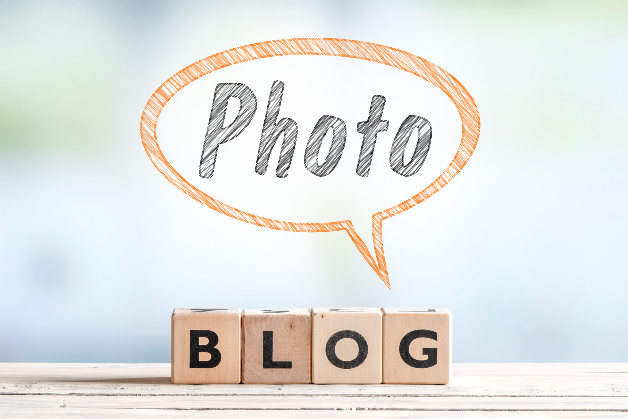 Photography blogger sign on a table