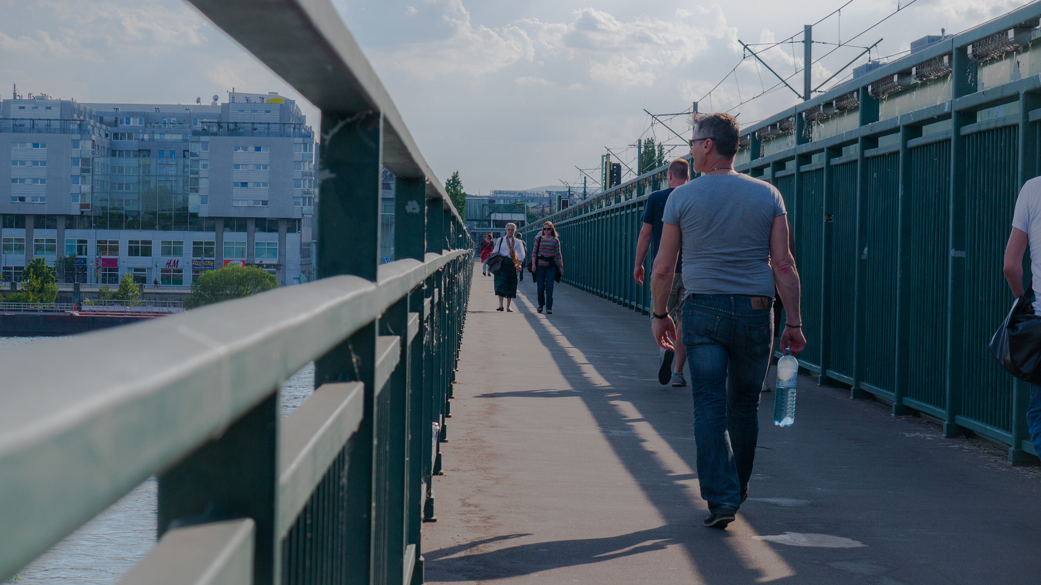 Panasonic Lumix DMC-GF6 sample photo. People walking on bridge photography