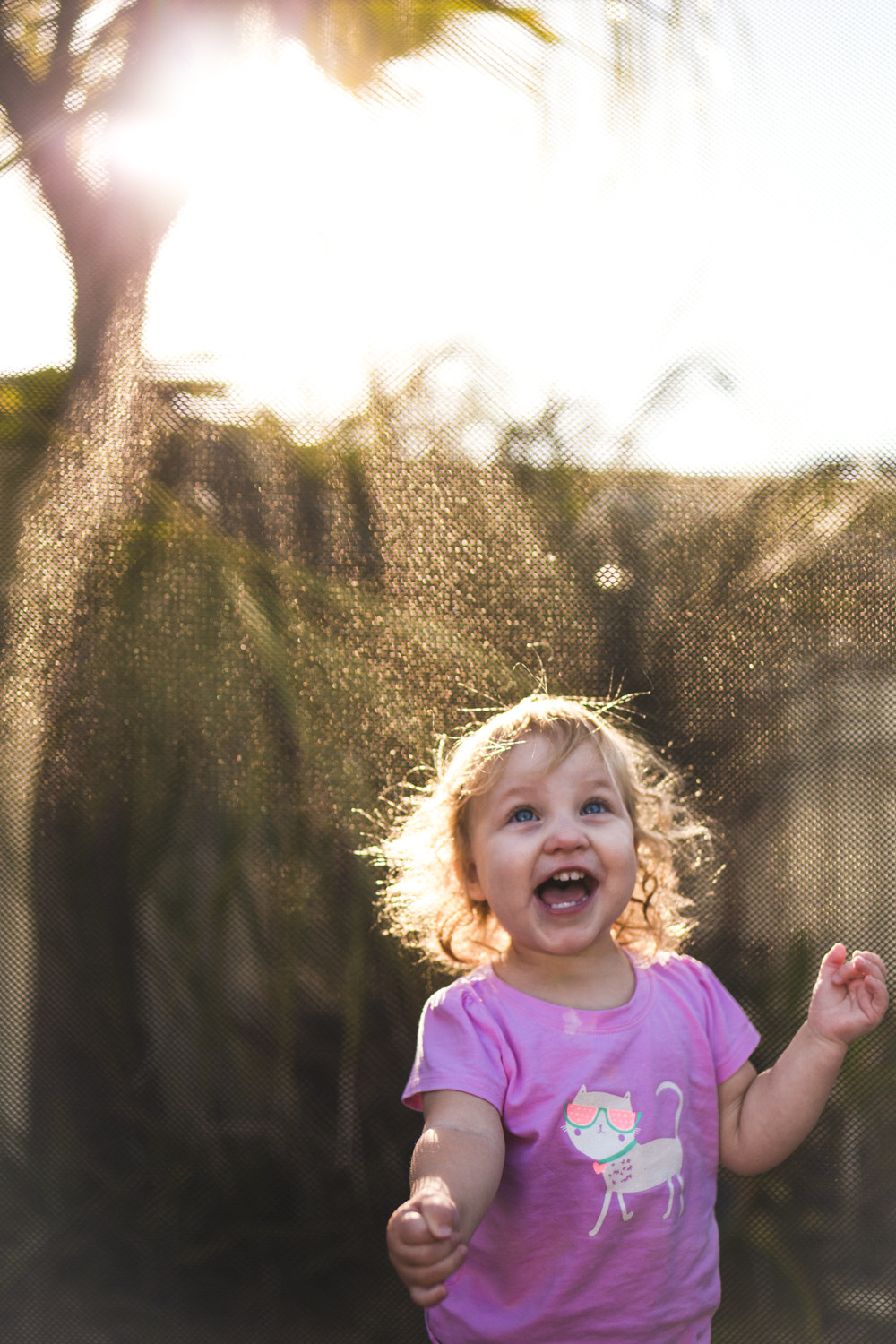 Tamron SP 45mm F1.8 Di VC USD sample photo. Niece and her trampoline photography