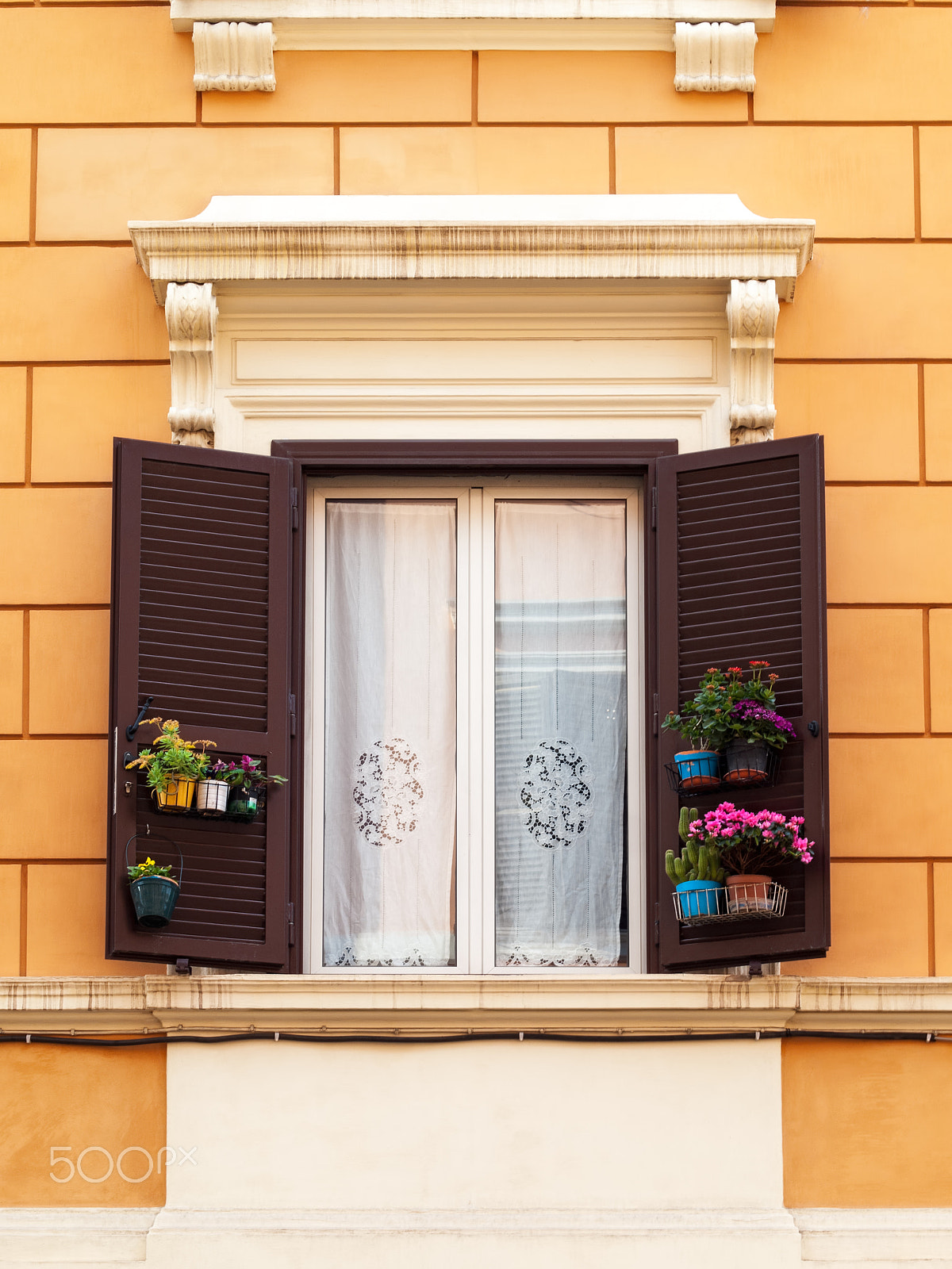 OLYMPUS 50mm Lens sample photo. Decorated shutters of the window photography