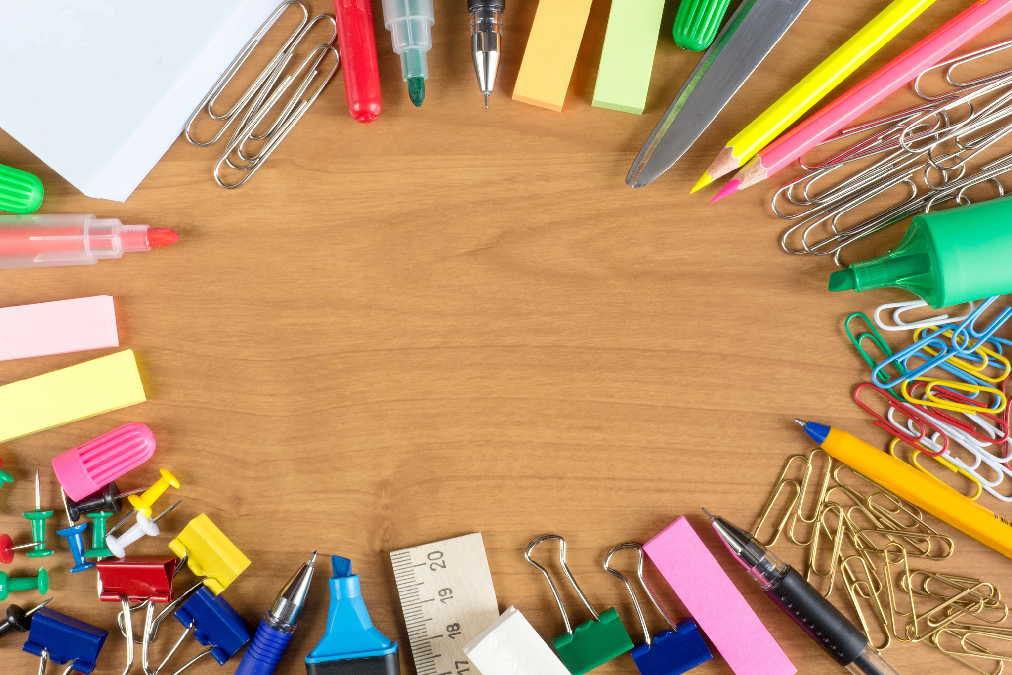Stationery objects on wooden desk