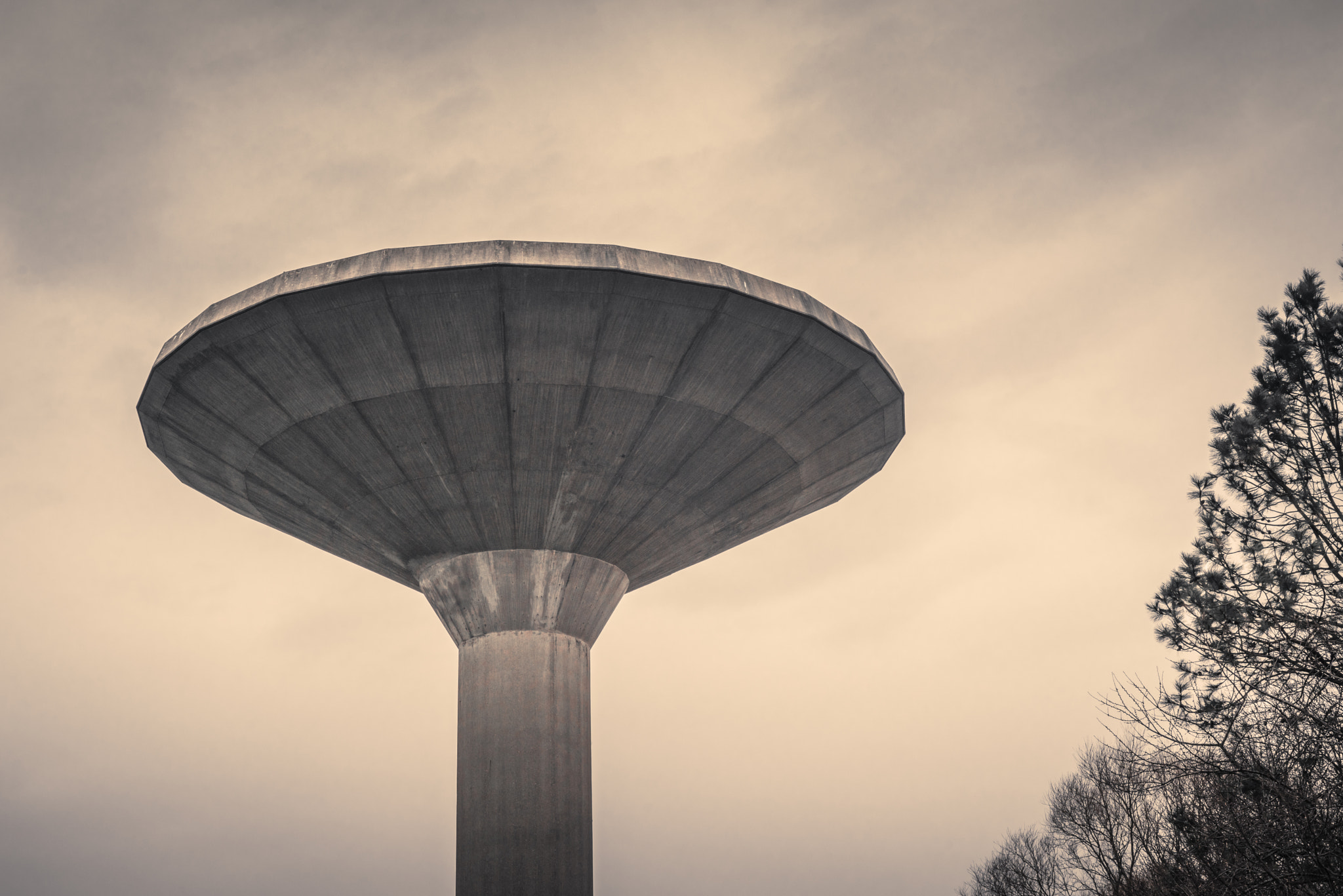 Sony 50mm F1.4 sample photo. Water facility tower in cloudy weather photography