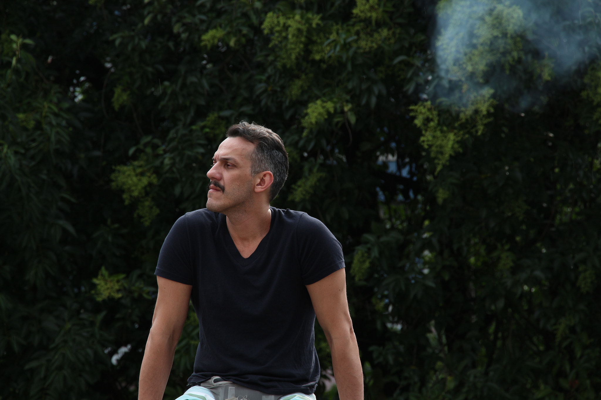 Canon EF-S 18-135mm F3.5-5.6 IS STM sample photo. The men and the smoke photography