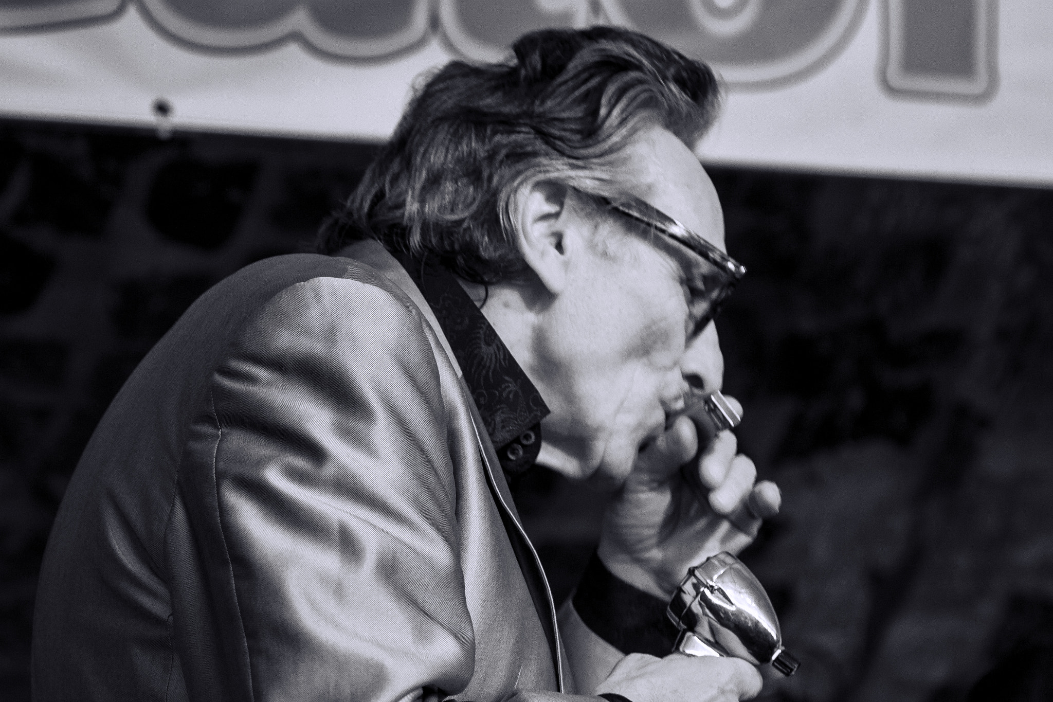 Canon EF 100-400mm F4.5-5.6L IS USM sample photo. Harmonica man photography