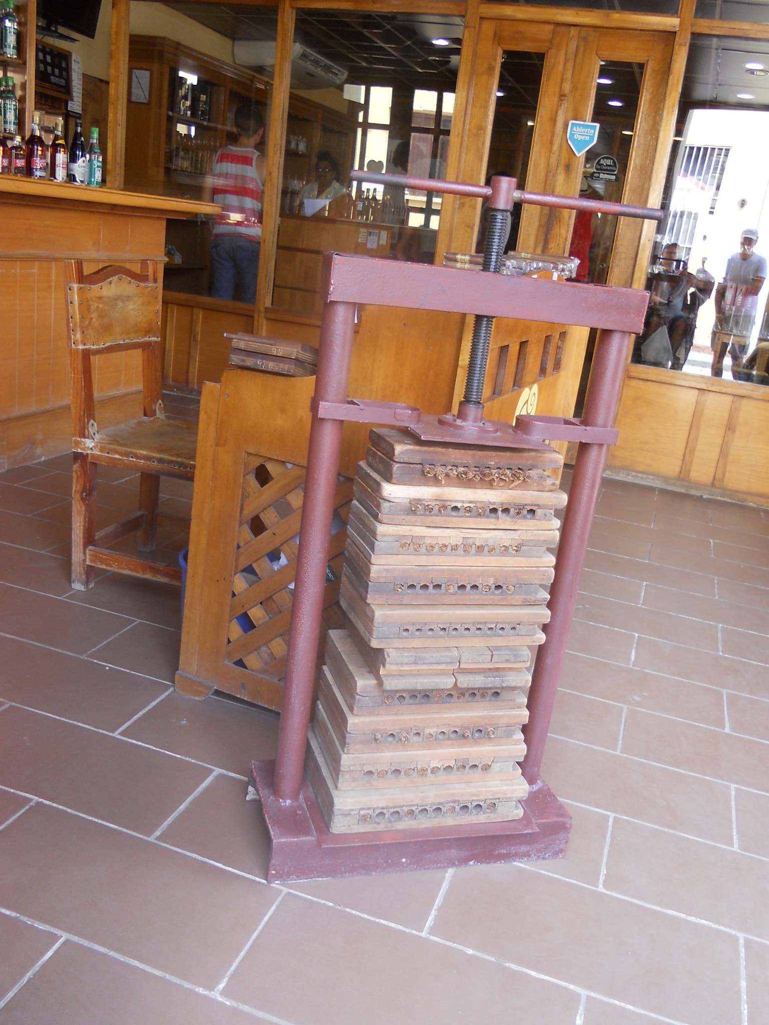 Nikon COOLPIX S2550 sample photo. A cigar press in a tobacconist shop, trinidad, cuba photography