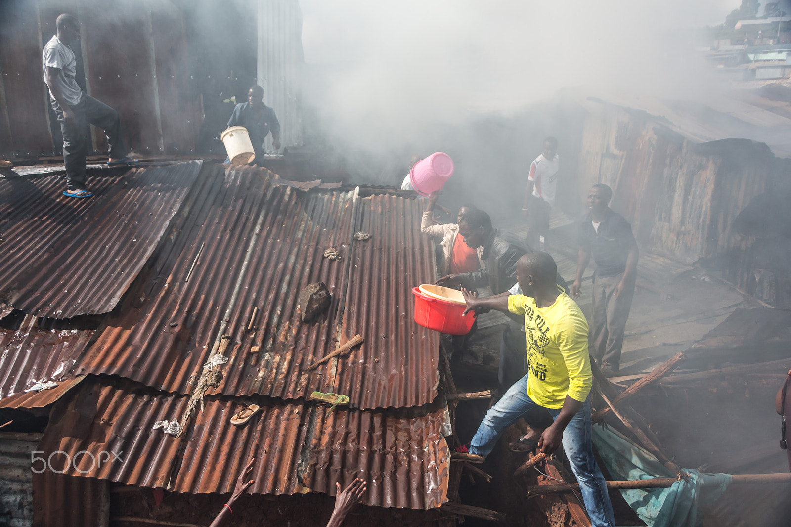 Canon EOS 700D (EOS Rebel T5i / EOS Kiss X7i) + Canon EF-S 18-135mm F3.5-5.6 IS STM sample photo. Fire in kibera photography