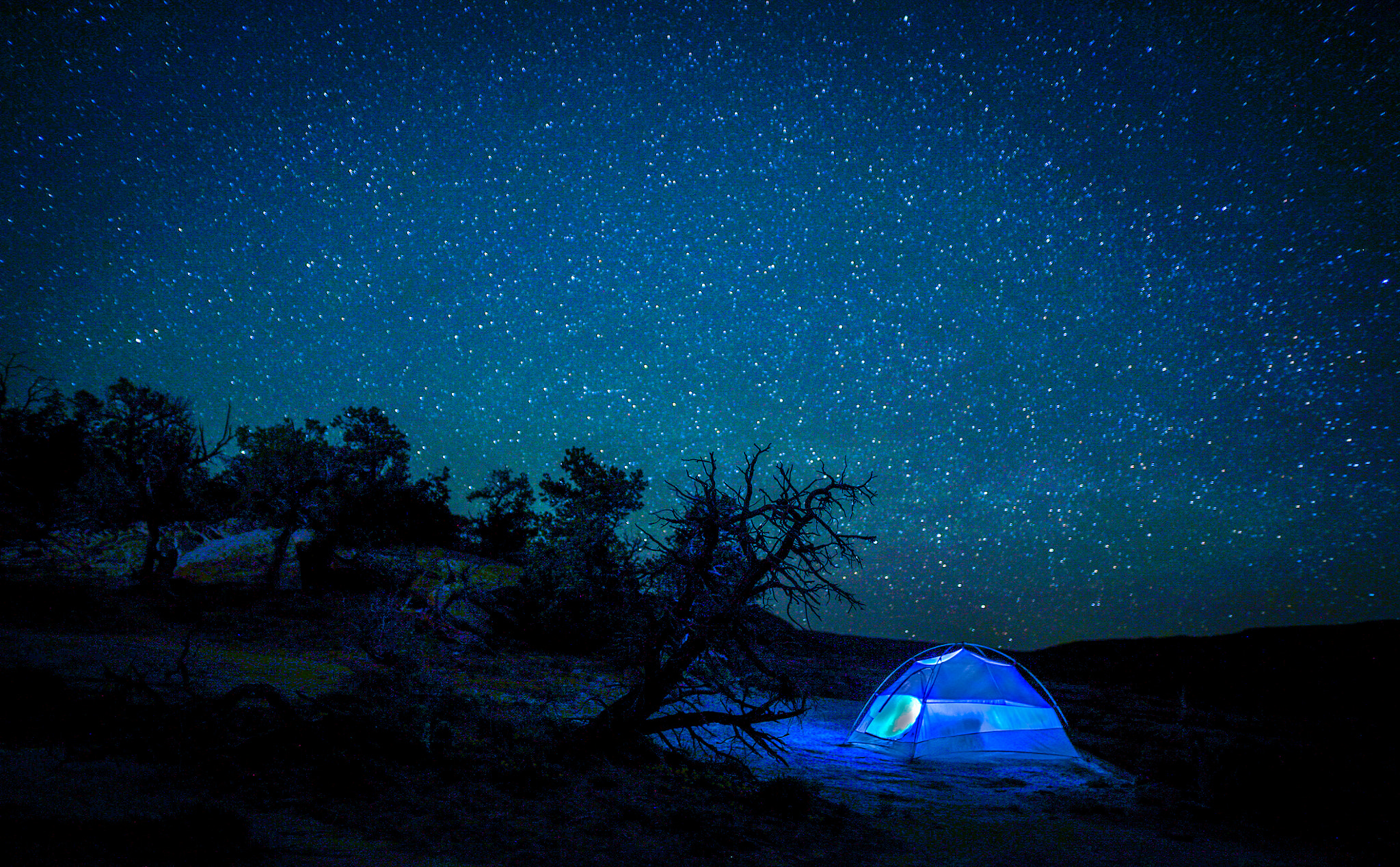 24mm F1.4 sample photo. Blue tent under stars photography