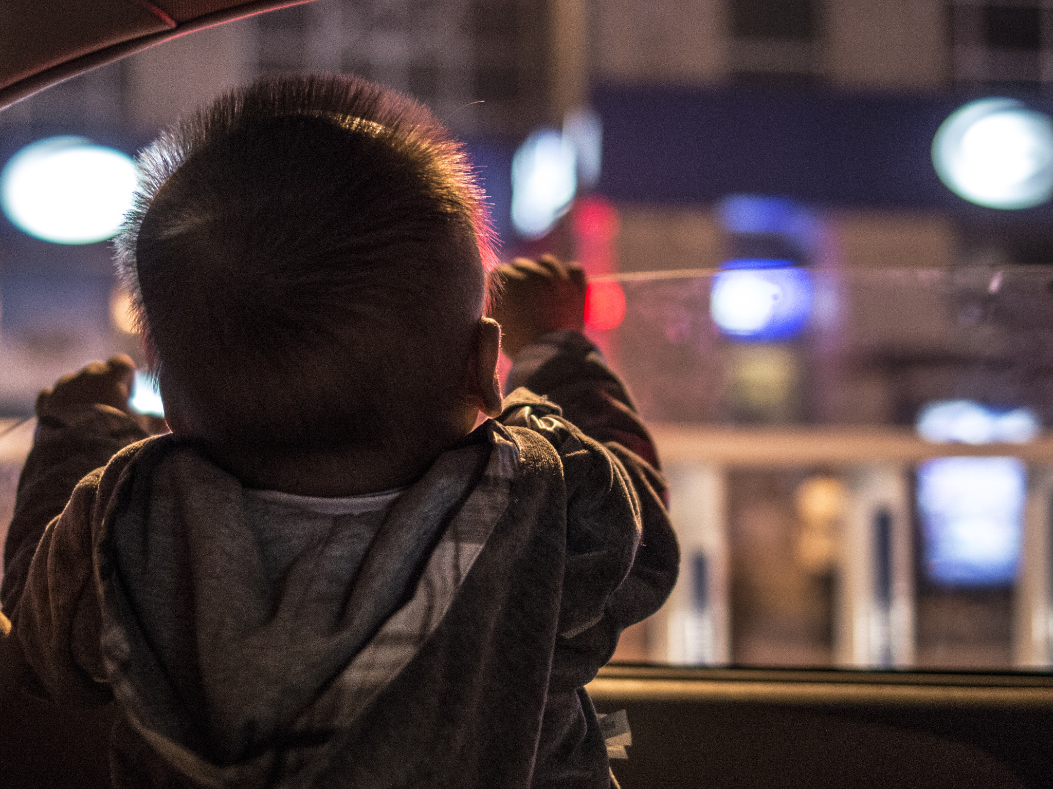 Pentax K-5 IIs sample photo. Peeking out of a car window photography