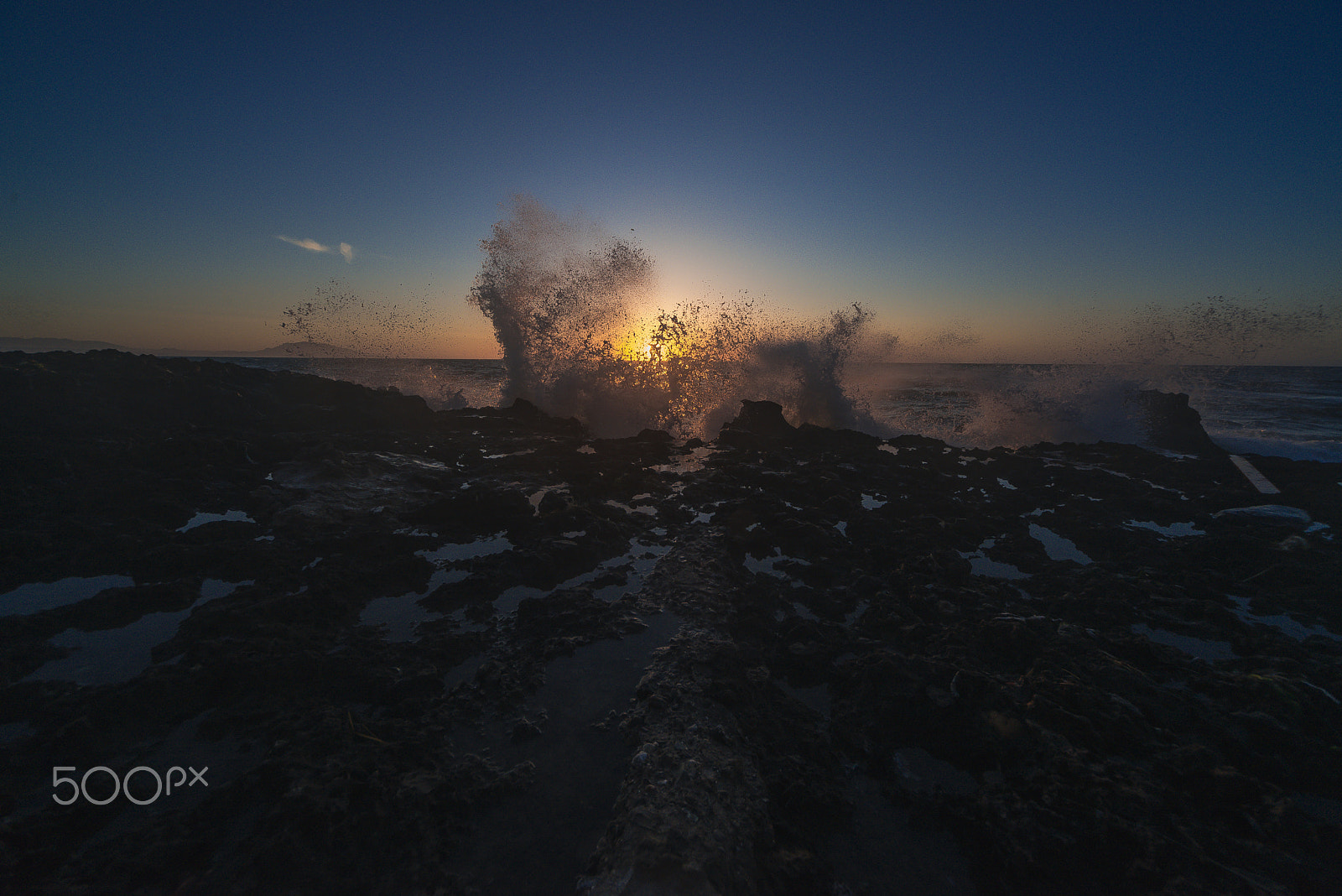Sigma 12-24mm F4.5-5.6 EX DG Aspherical HSM sample photo. Waves bursting on rocks photography