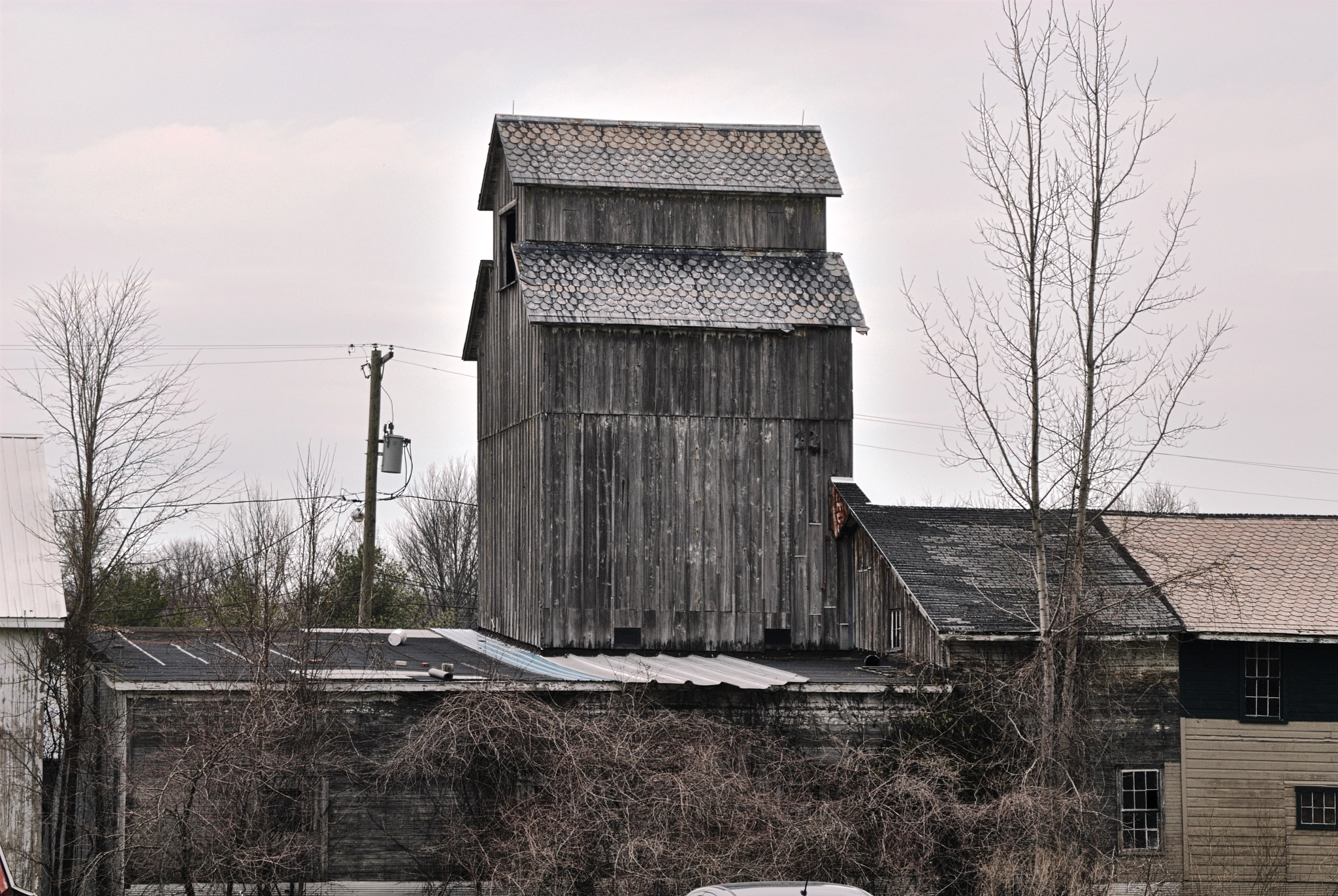 Nikon D200 + AF Zoom-Nikkor 35-70mm f/3.3-4.5 sample photo. Older grain mill photography