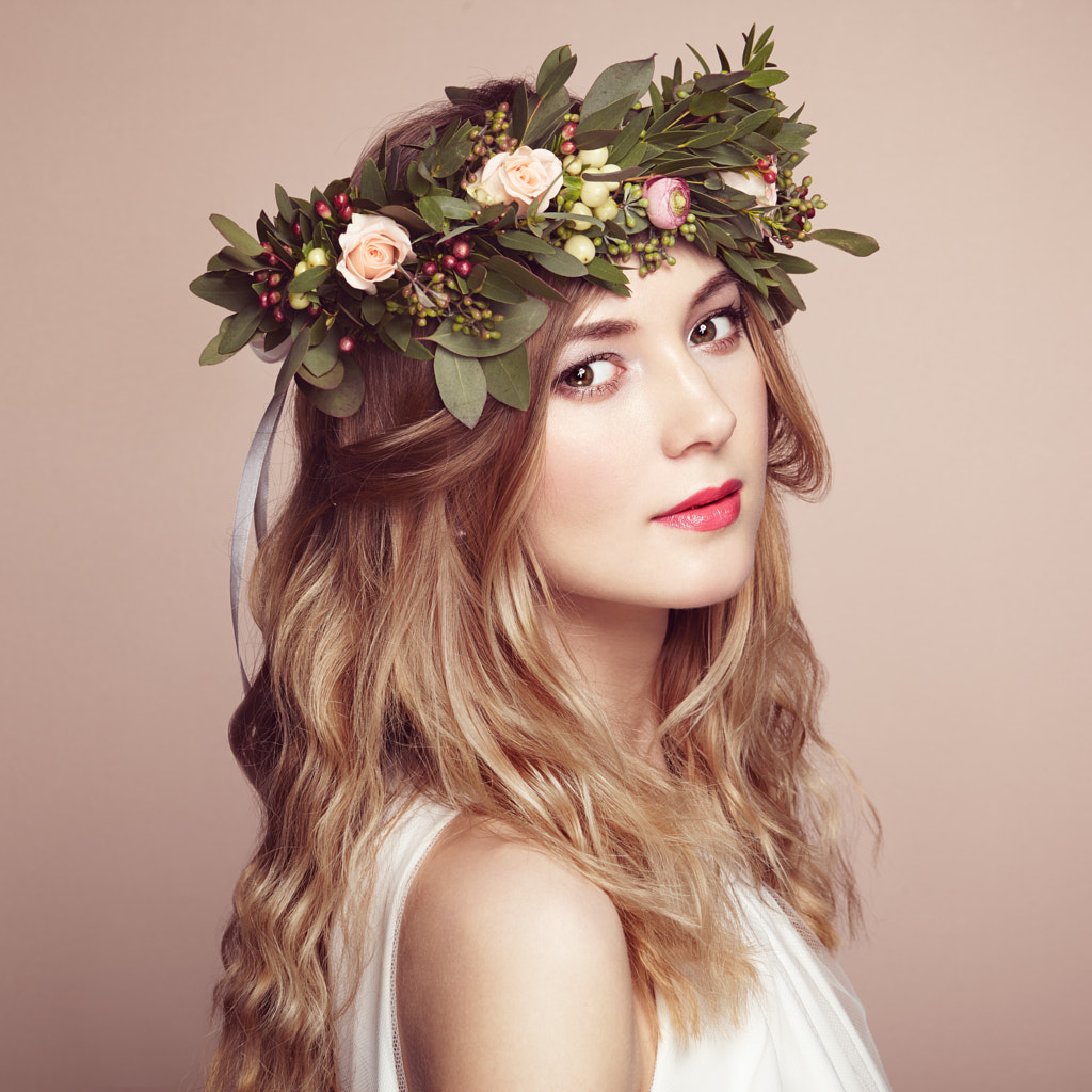 Beautiful blonde woman with flower wreath on her head by Oleg Gekman on 500px.com