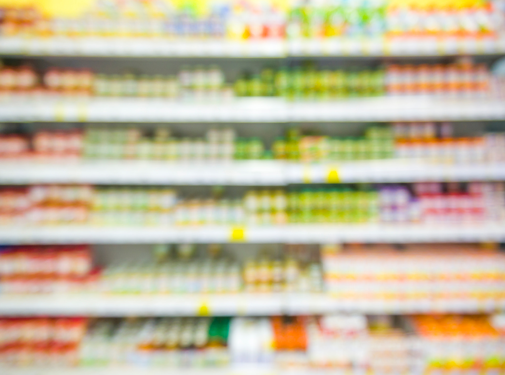 LUMIX G VARIO PZ 14-42/F3.5-5.6 sample photo. Blurred baby foods jars in store photography