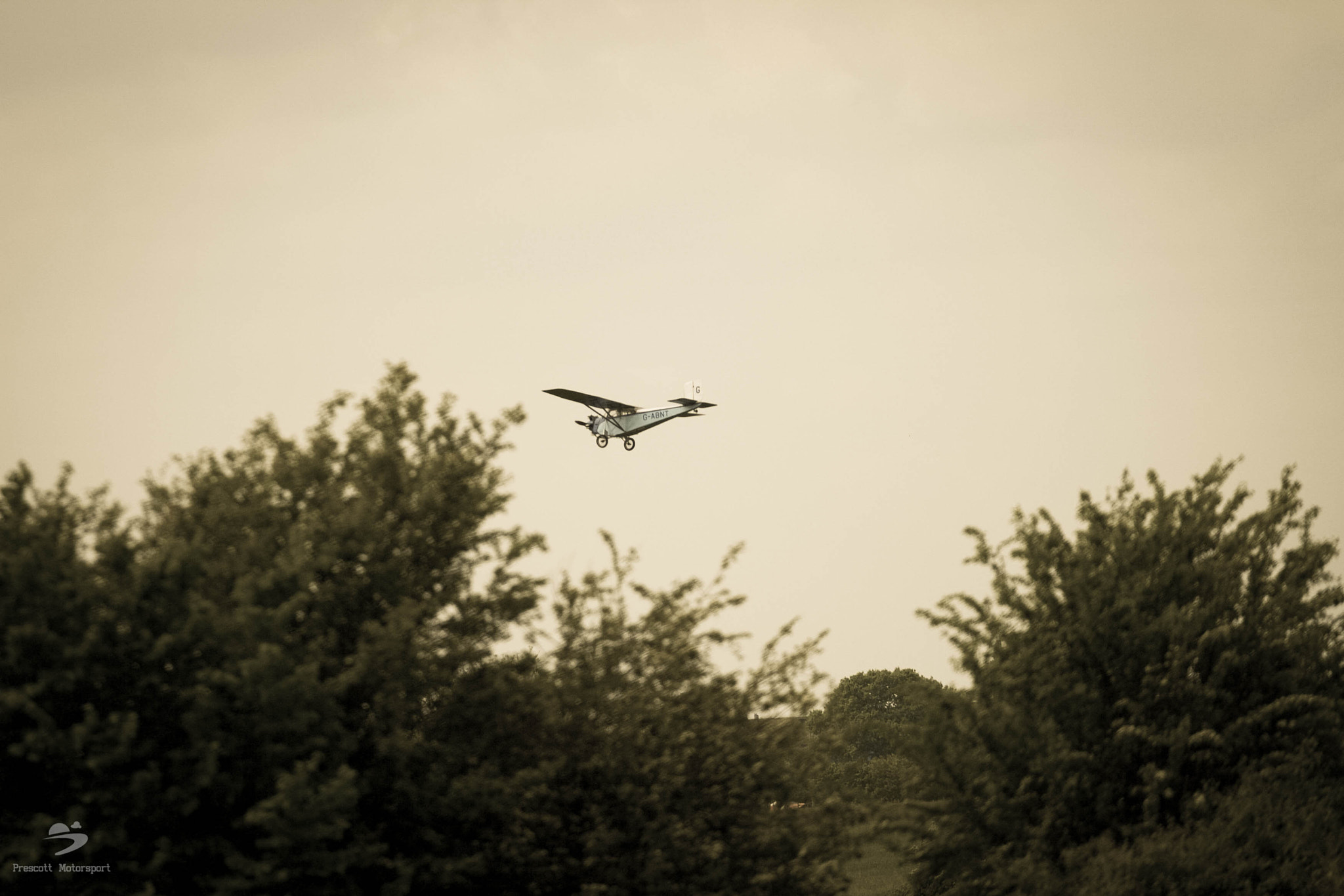 Canon EOS 30D + Canon EF 70-200mm F4L USM sample photo. Retro looking plane photography