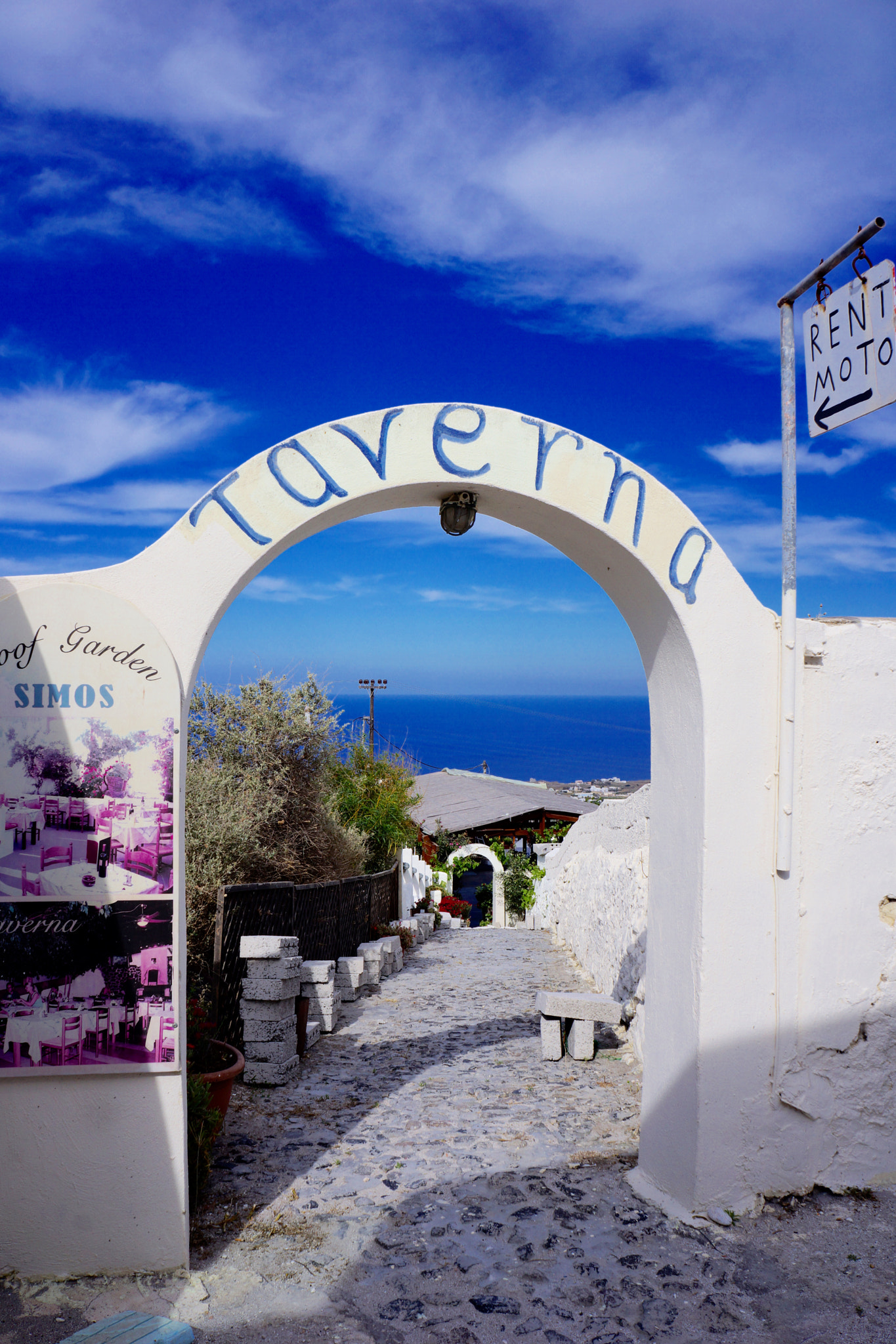 Sony Alpha NEX-7 + Tamron 18-200mm F3.5-6.3 Di III VC sample photo. Beautiful port town of santorini, greece photography