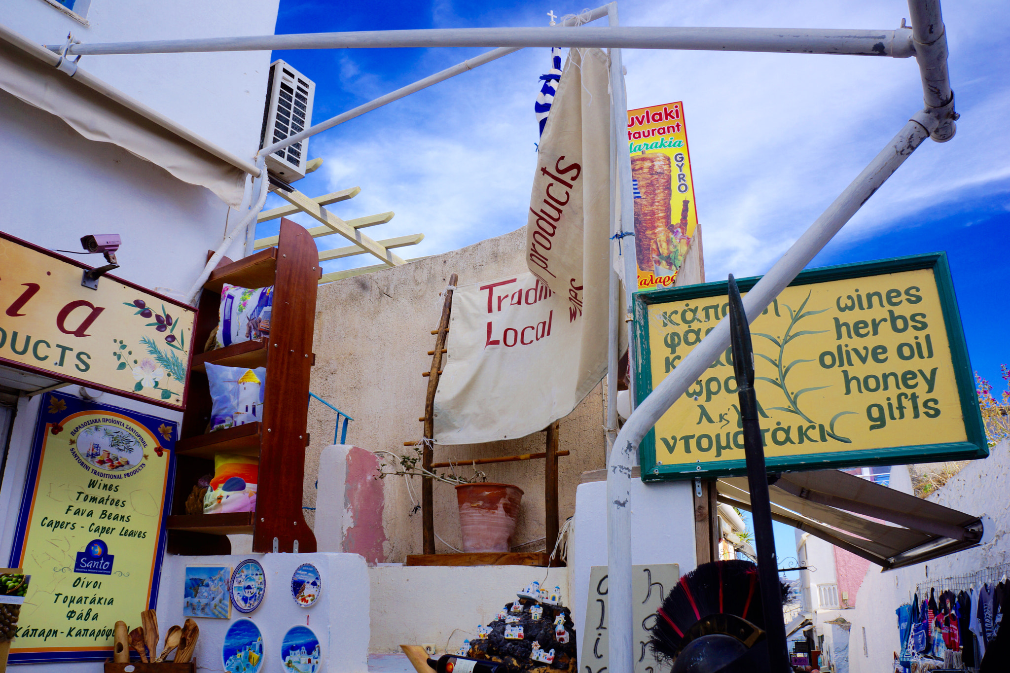 Sony Alpha NEX-7 + Tamron 18-200mm F3.5-6.3 Di III VC sample photo. Beautiful port town of santorini, greece photography