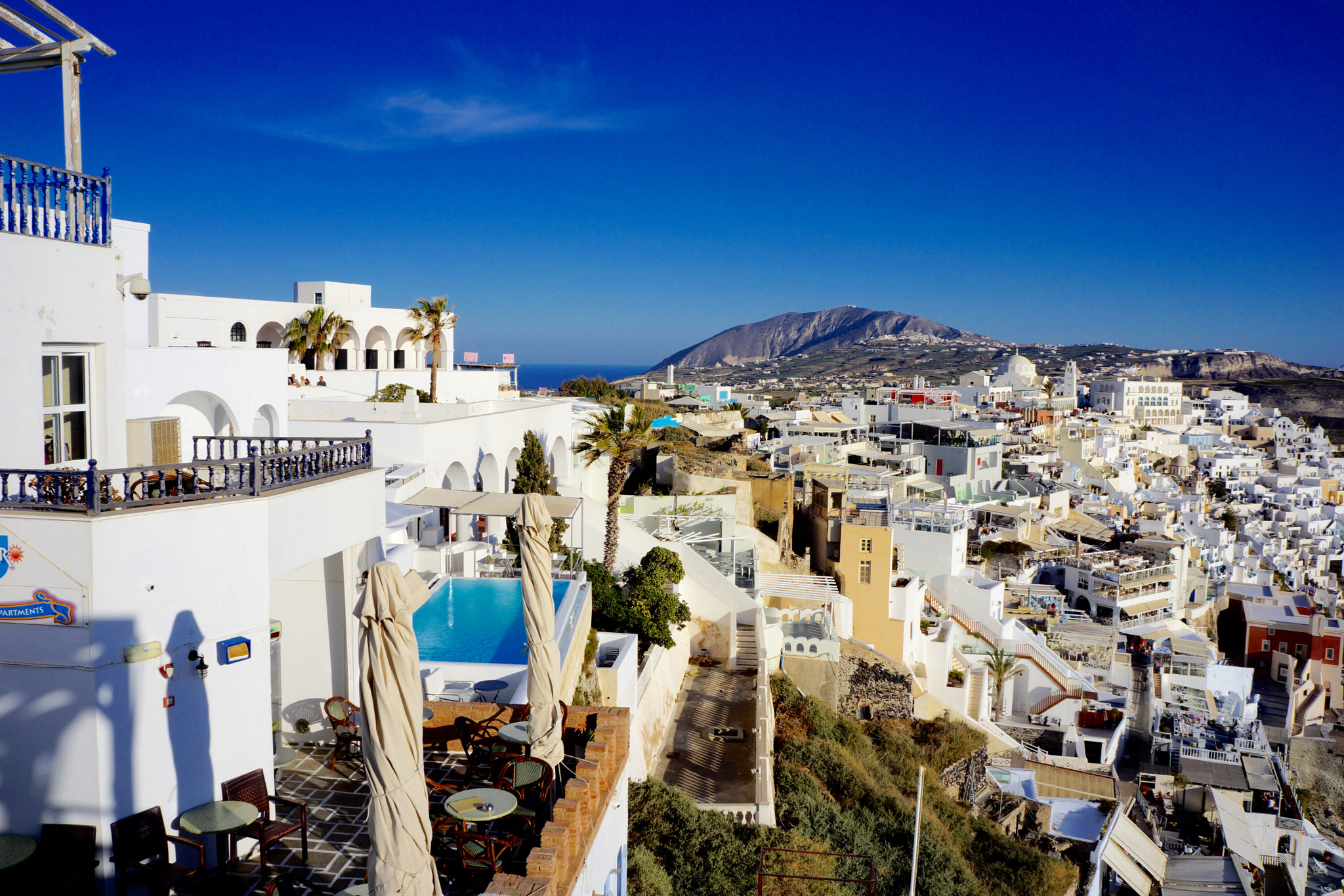 Sony Alpha NEX-7 + Tamron 18-200mm F3.5-6.3 Di III VC sample photo. Beautiful port town of santorini, greece photography