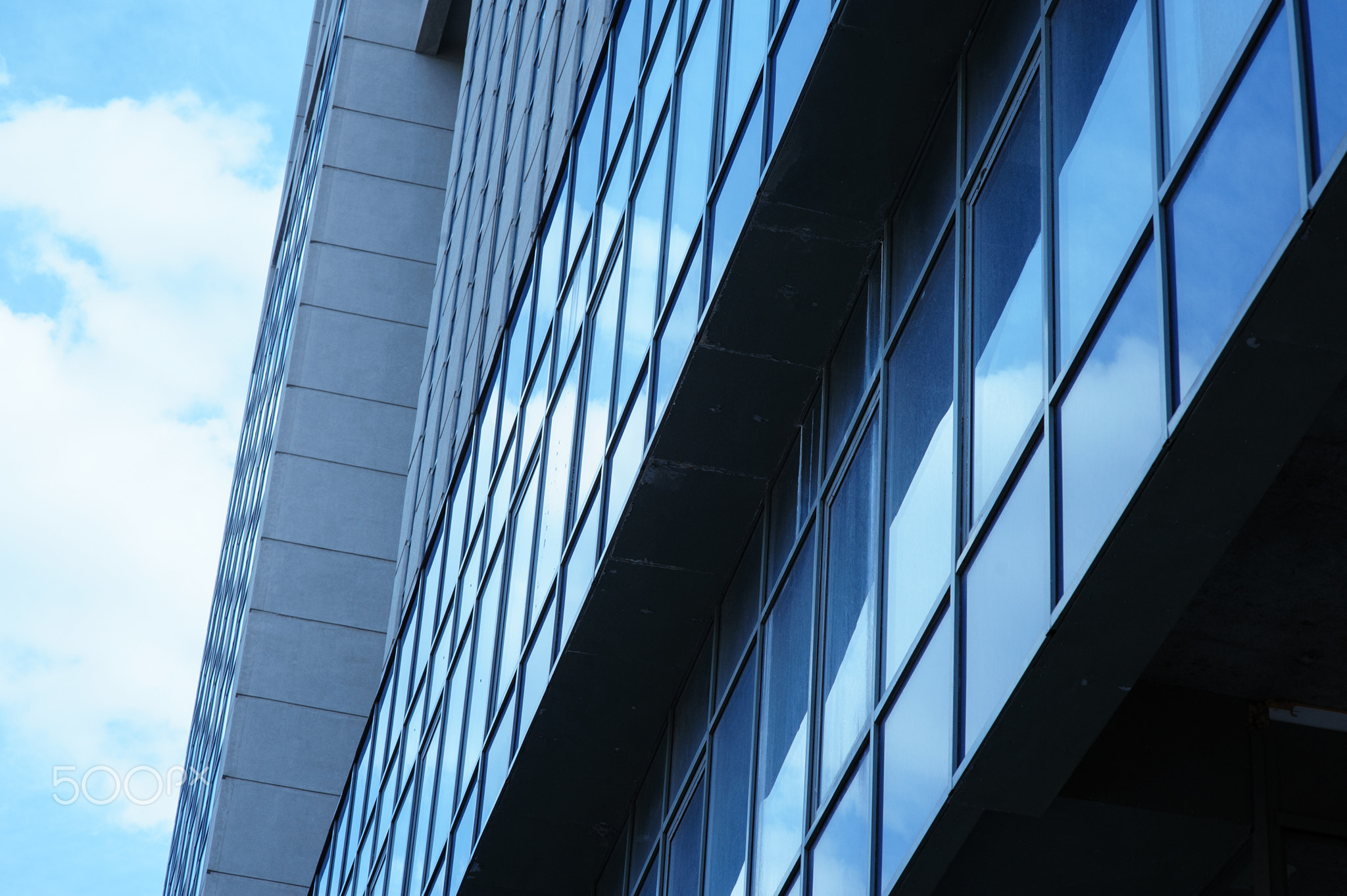 High rise building with window line pattern perspective