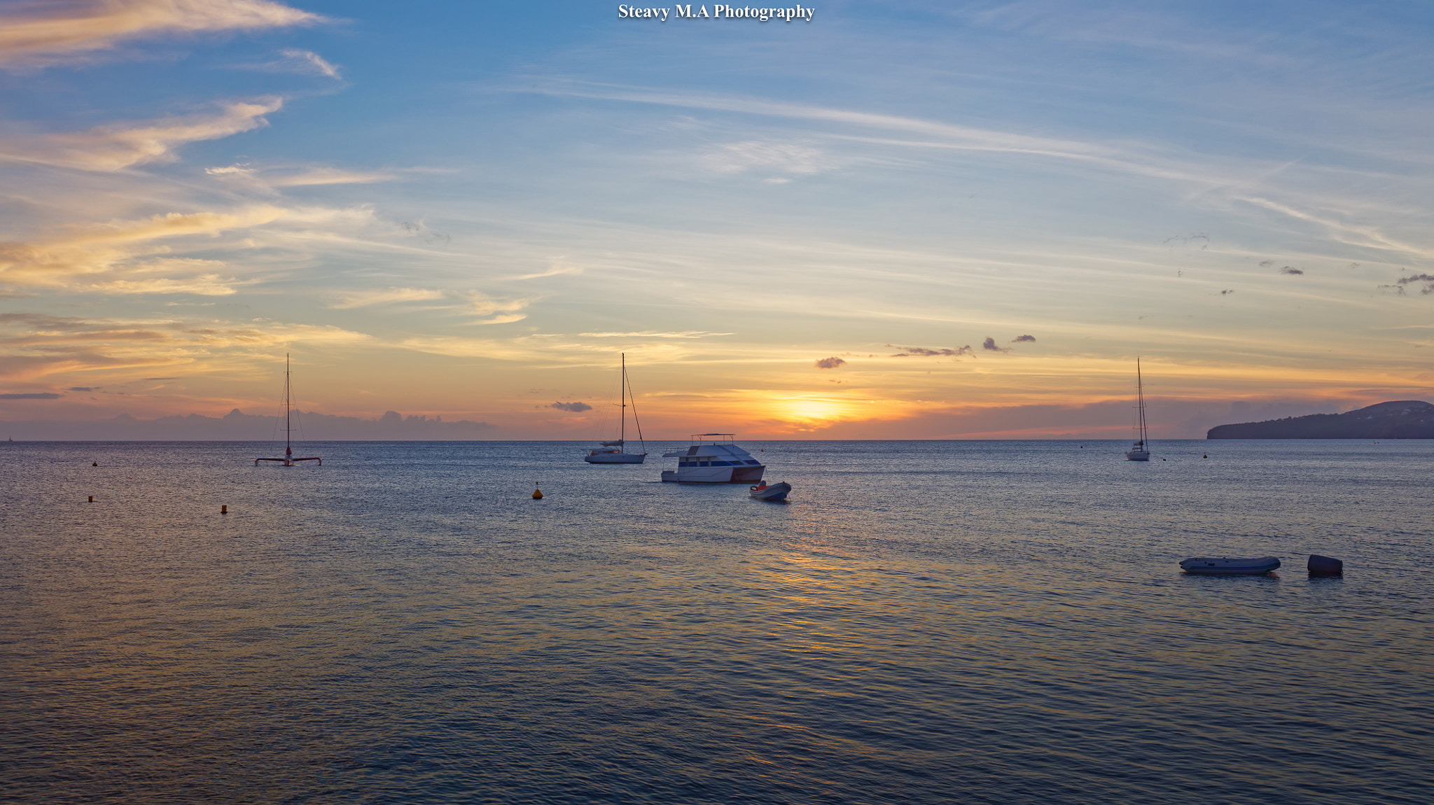 Canon EF 35mm F1.4L II USM sample photo. Sunset boats photography