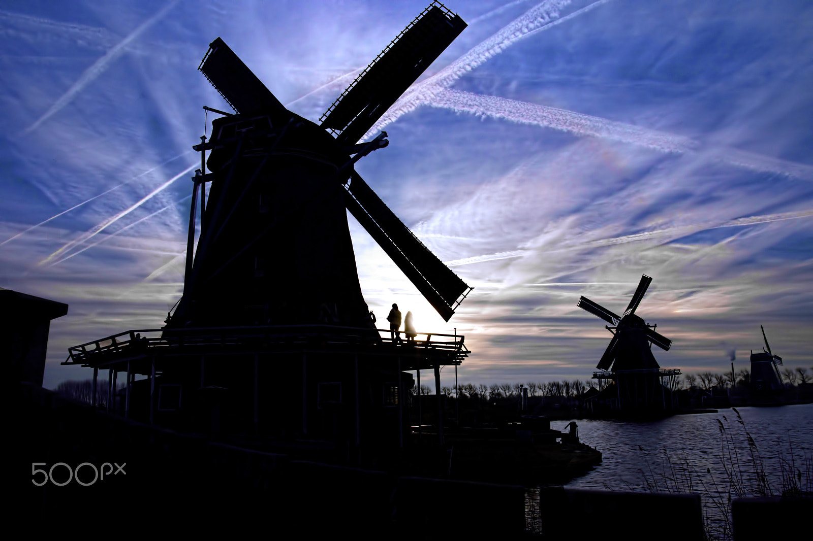 Tamron 18-270mm F3.5-6.3 Di II PZD sample photo. Sillouette of old windmills at zaanse schans. photography