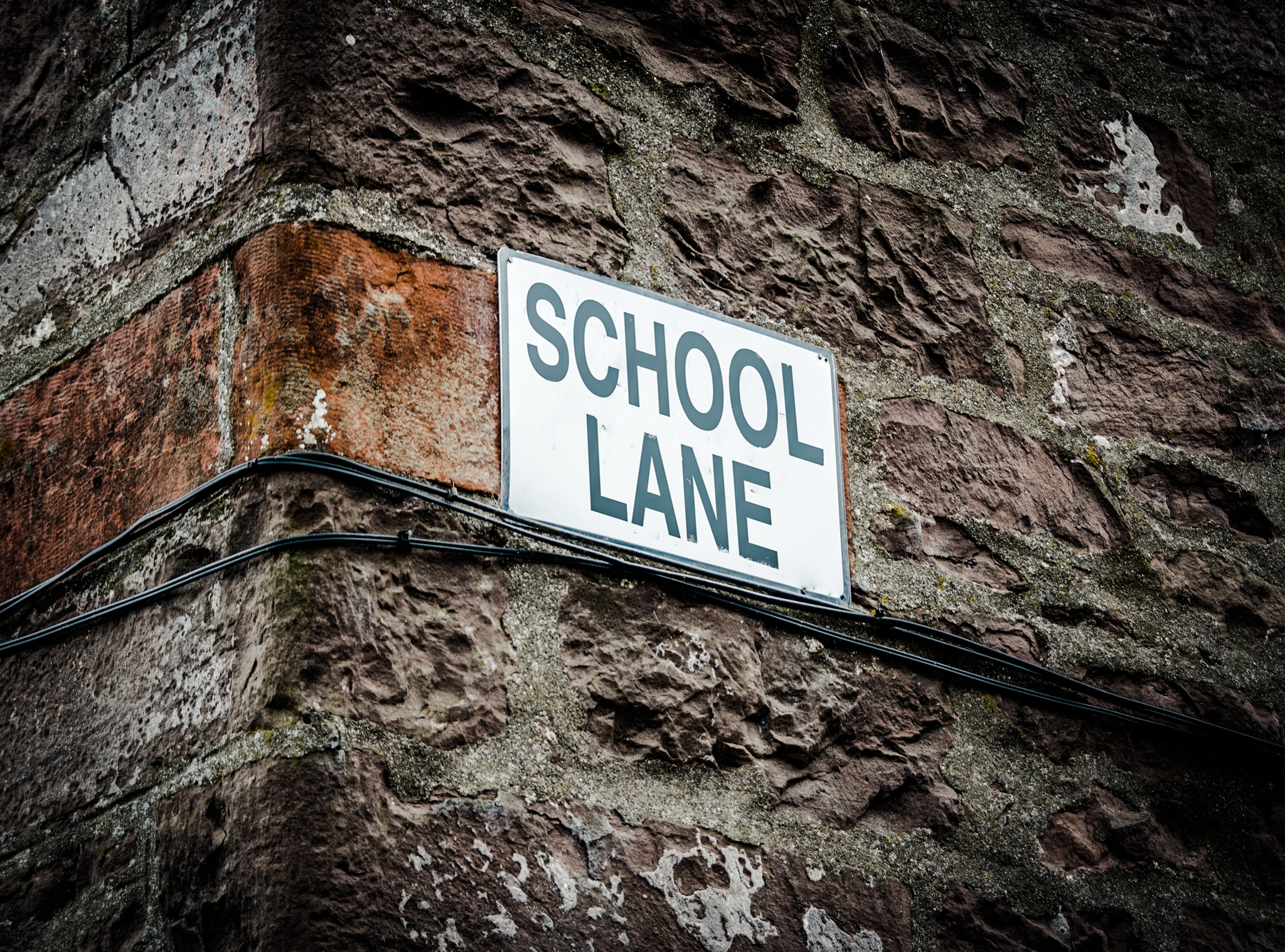 Sigma 28-200mm F3.5-5.6 Compact Aspherical Hyperzoom Macro sample photo. School lane sign photography
