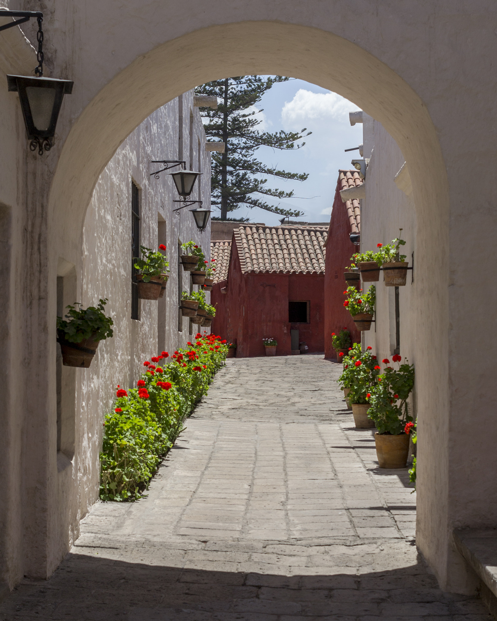 Nikon D3100 + Nikon AF Nikkor 35mm F2D sample photo. Alleyway at santa catalina monastery photography