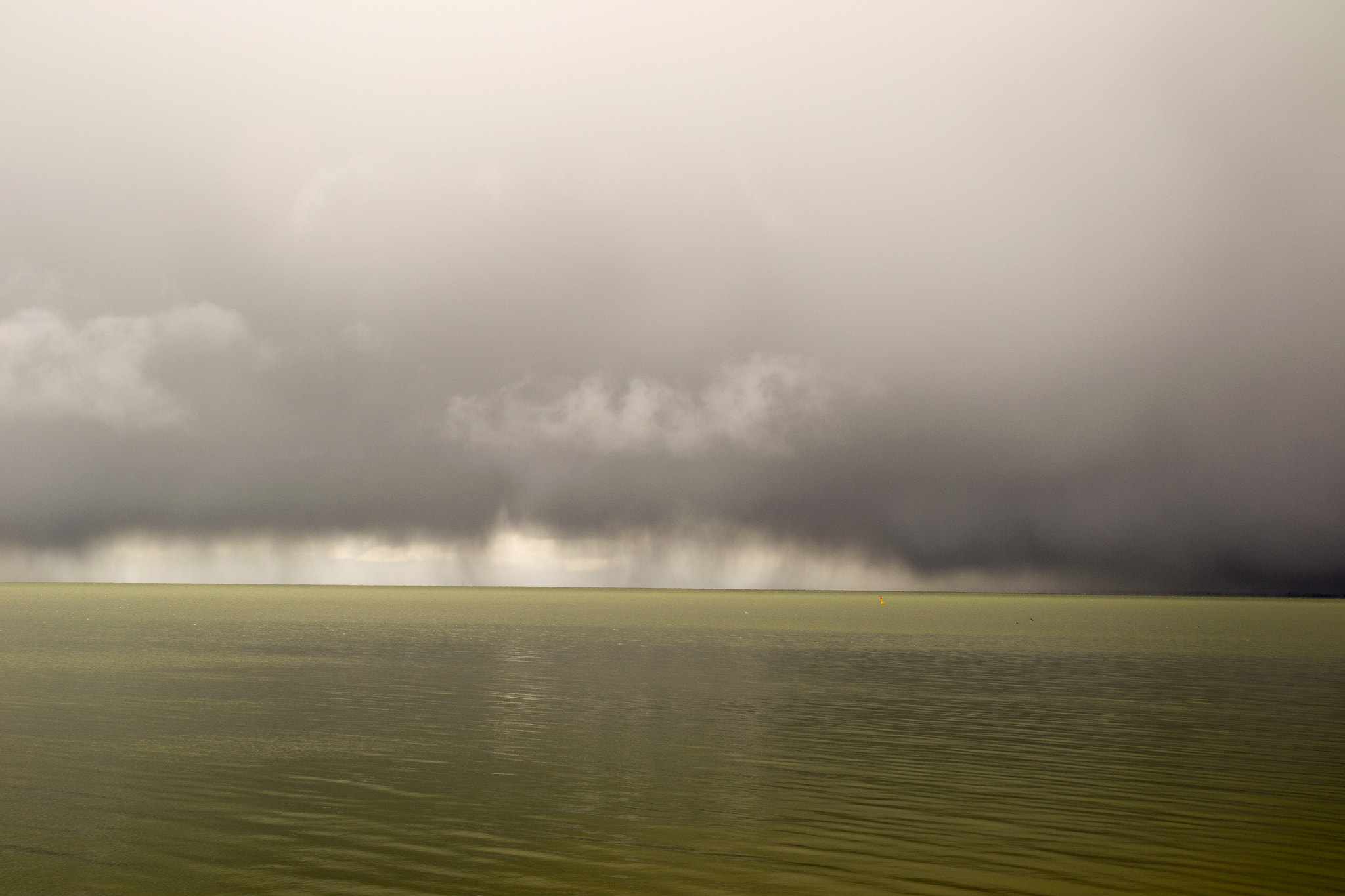 Sigma 17-70mm F2.8-4 DC Macro OS HSM sample photo. Rain in the distance photography