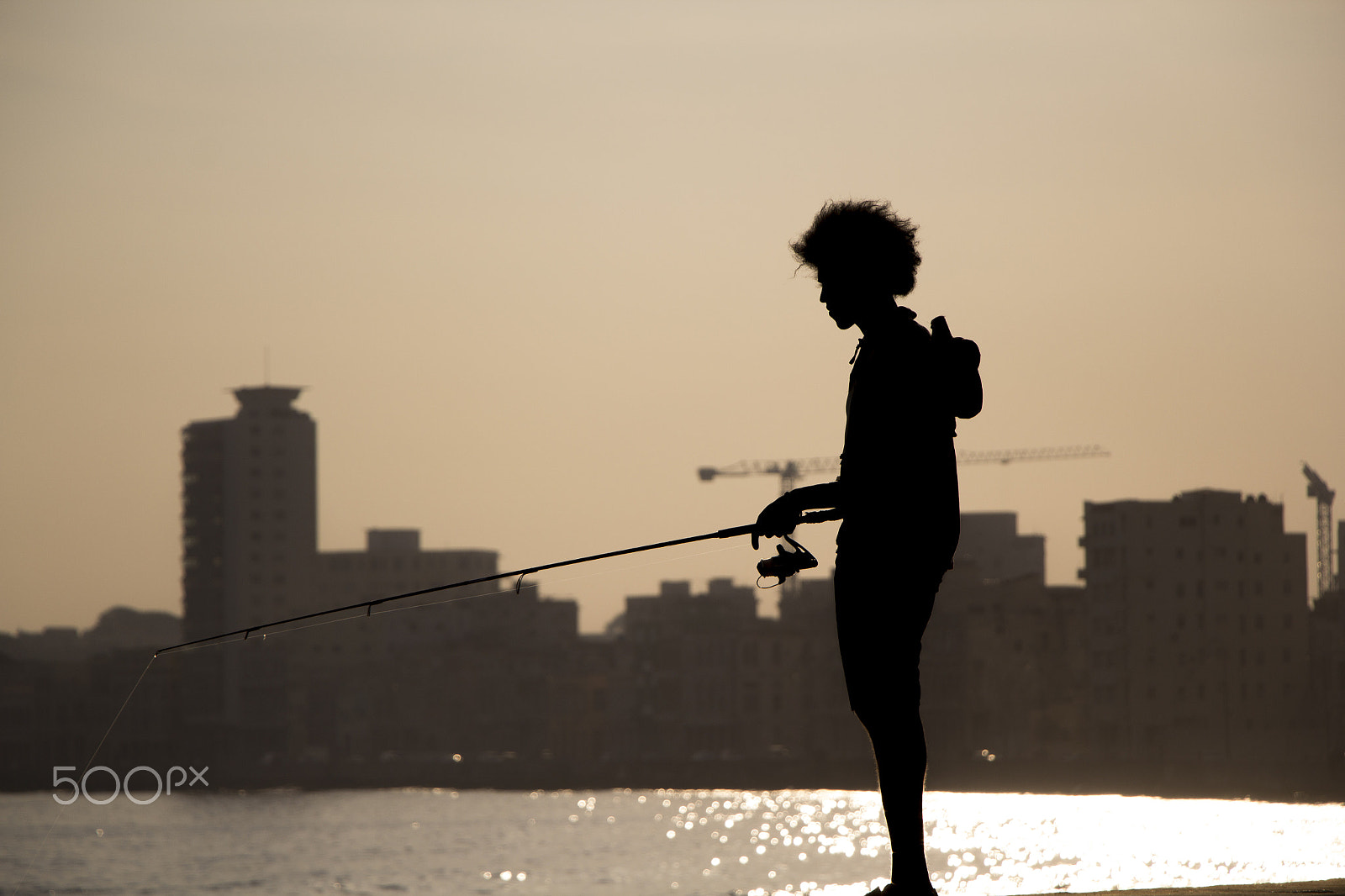Canon EF-S 18-135mm F3.5-5.6 IS STM sample photo. Fishing man photography