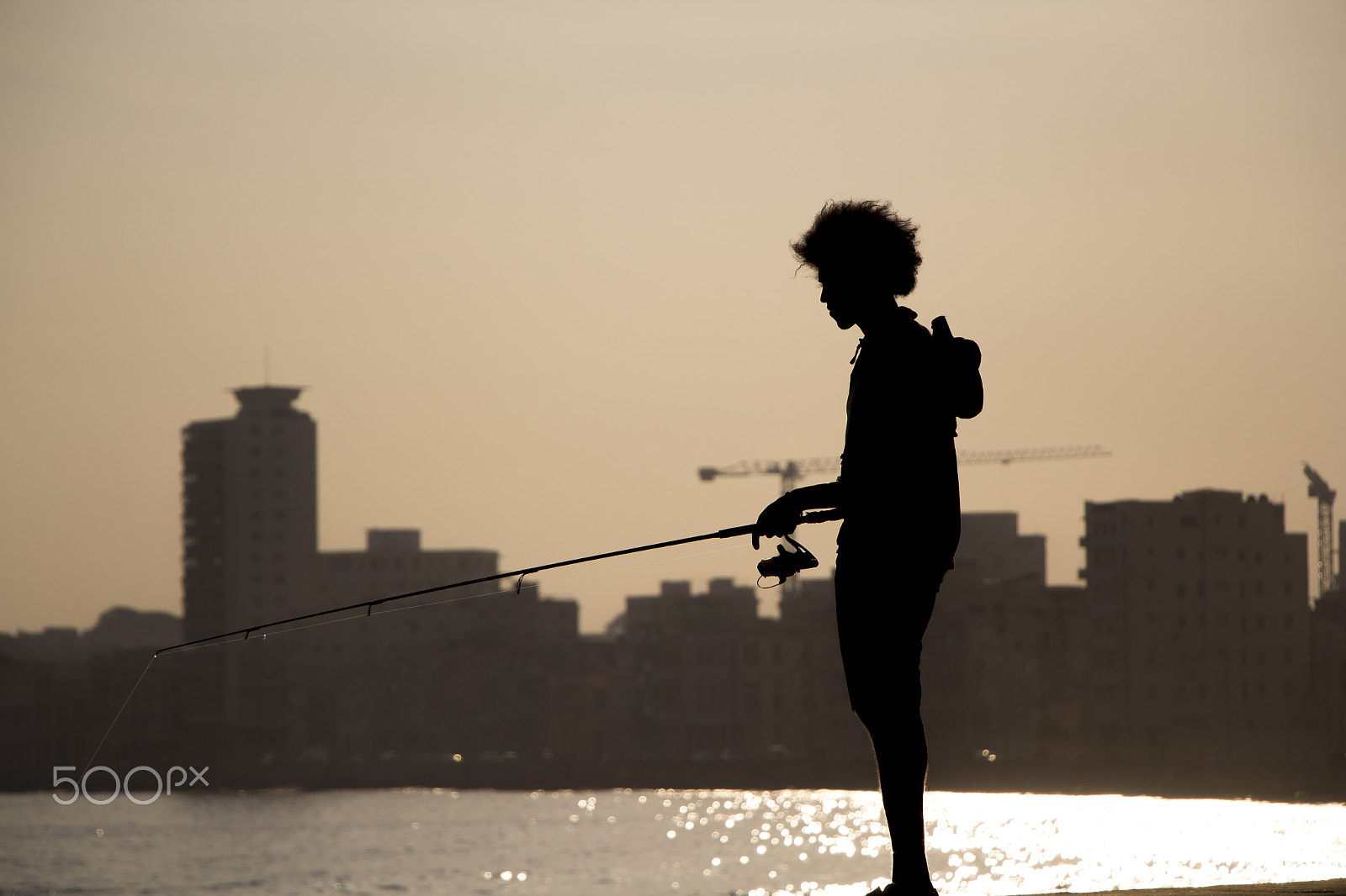 Canon EOS 60D + Canon EF-S 18-135mm F3.5-5.6 IS STM sample photo. Fishing man photography